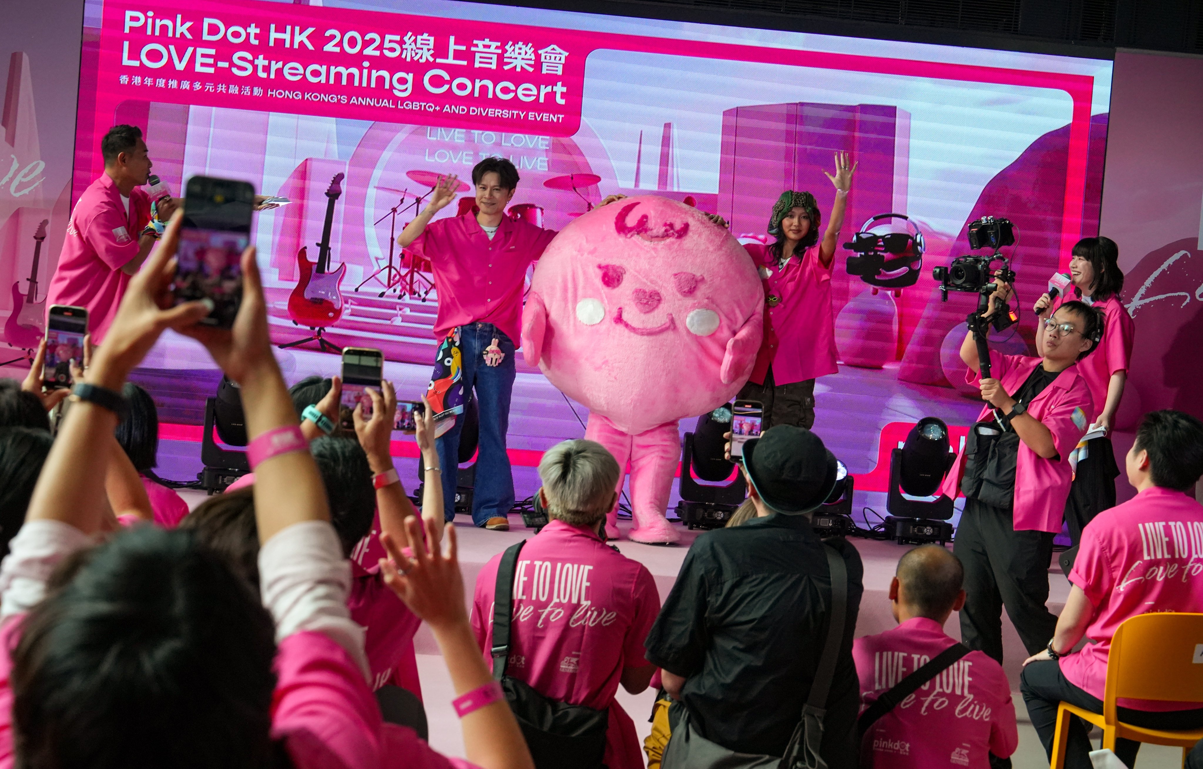Cantopop stars On Chan (second from left on stage) and Marf, from the girl group Collar, were the ambassadors for Pink Dot HK in 2025. Photo: Sun Yeung