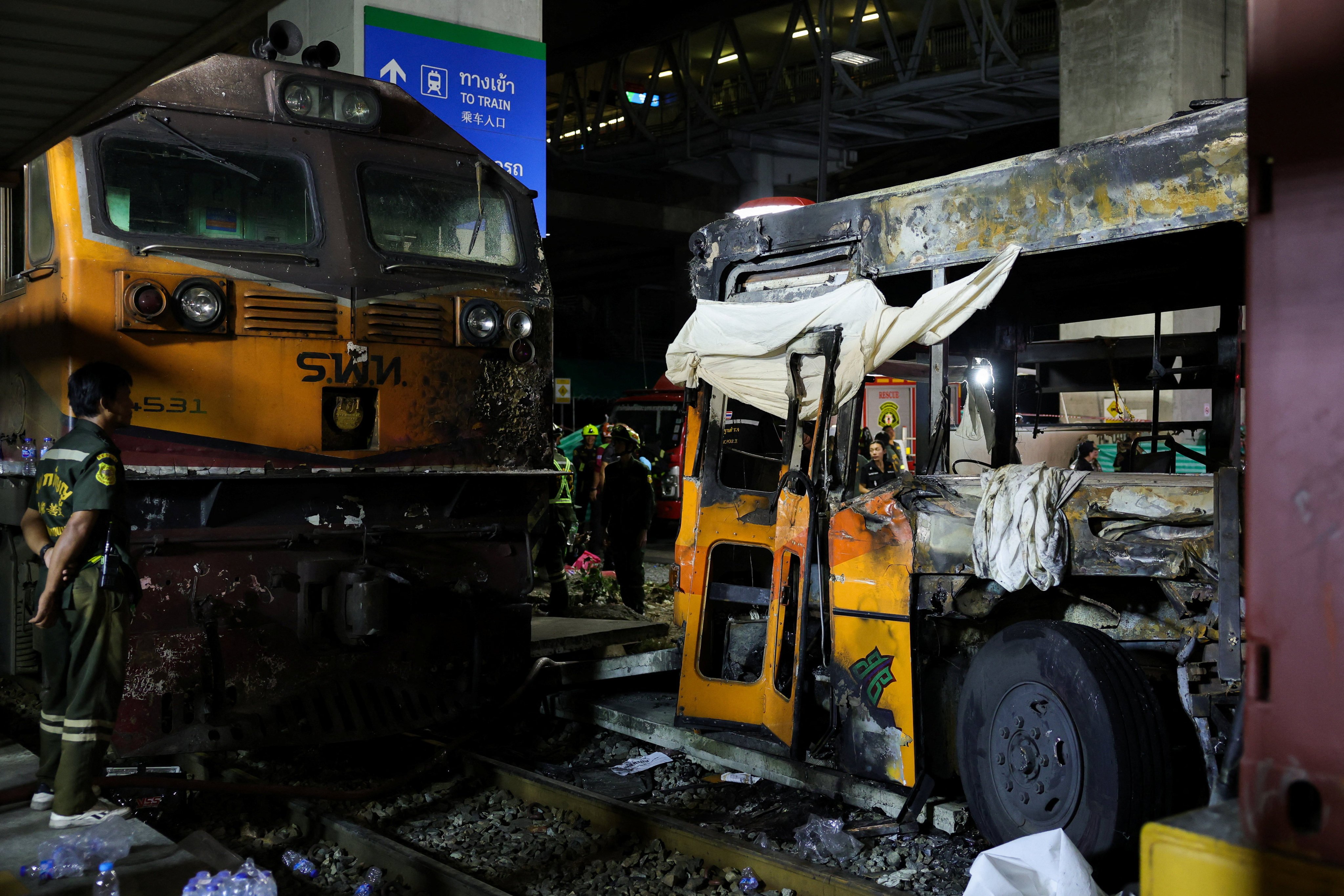 A view of a train and a bus after their collision with several cars on Asok-Din Daeng Road, causing several casualties, in Bangkok, Thailand, May 16, 2026. REUTERS/Athit Perawongmetha
