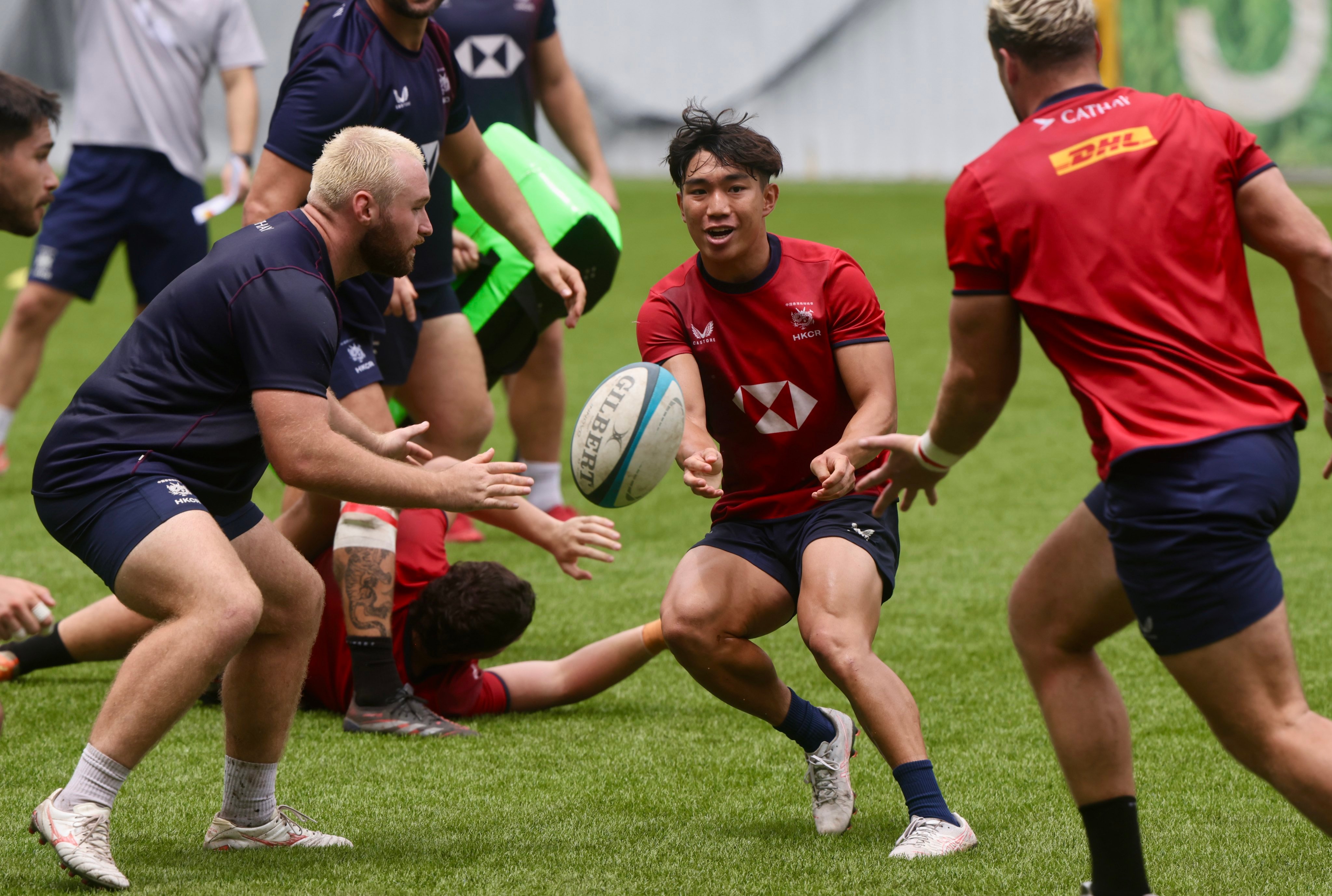 Scrumhalf Chui Wai-lap passes to a teammate during a Hong Kong training session at SCAA stadium. Photo: Jonathan Wong