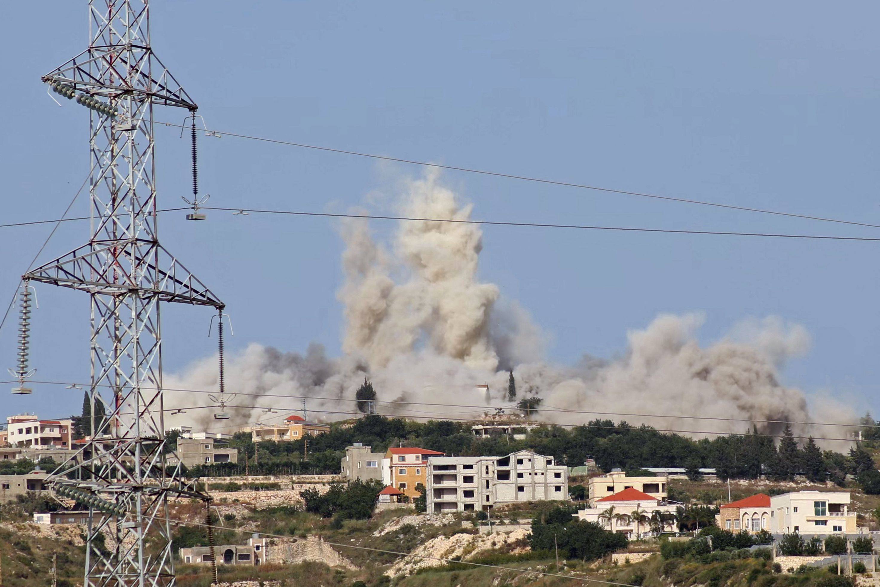 Smoke rises from the site of an Israeli air strike that targeted the southern Lebanese village of Tourzai on Sunday. Photo: AFP
