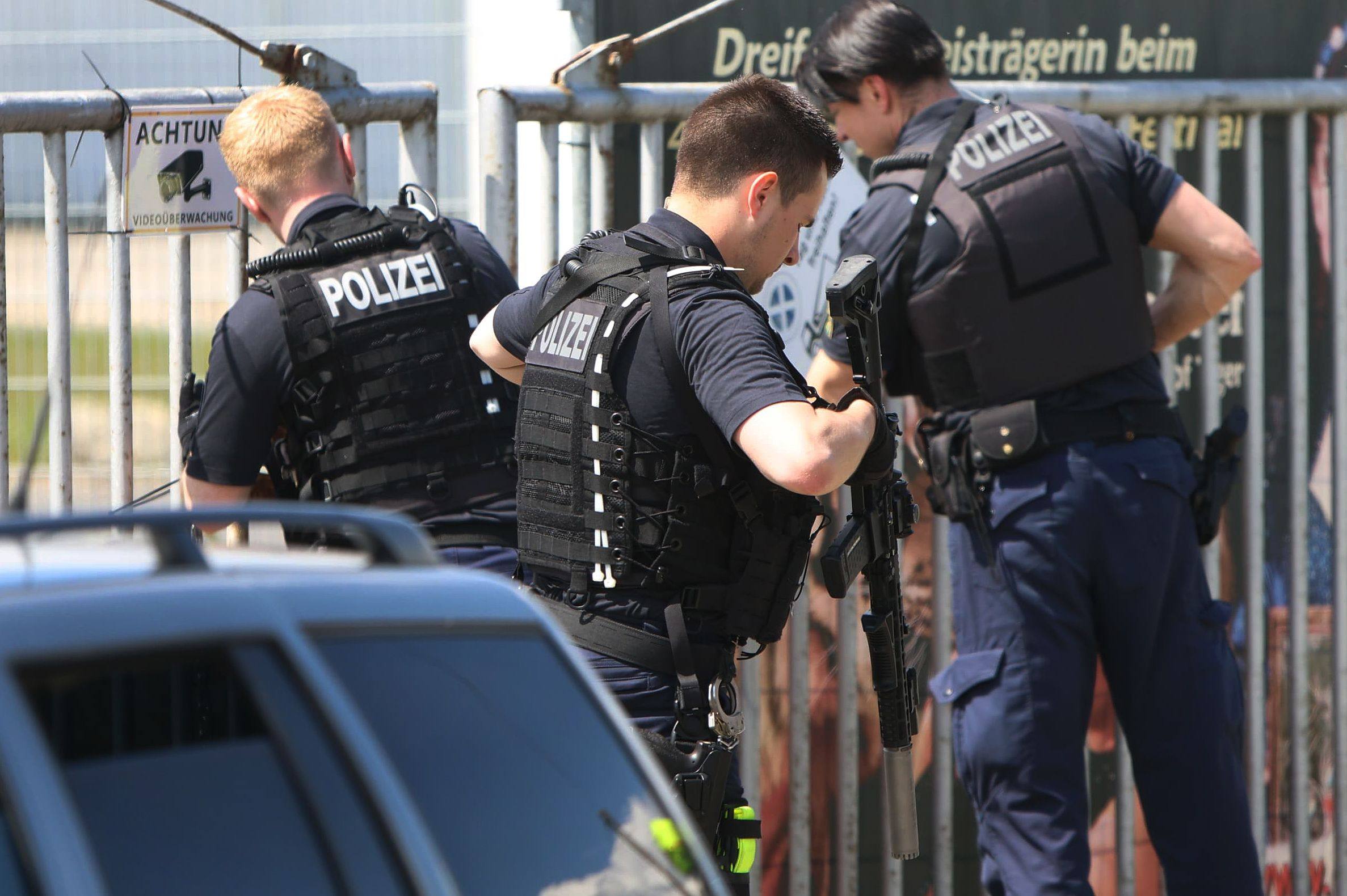 Heavily armed police officers on the scene in an industrial park in Schkeuditz, near the city of Leipzig, Germany on Sunday. Photo: EHL Media / dpa