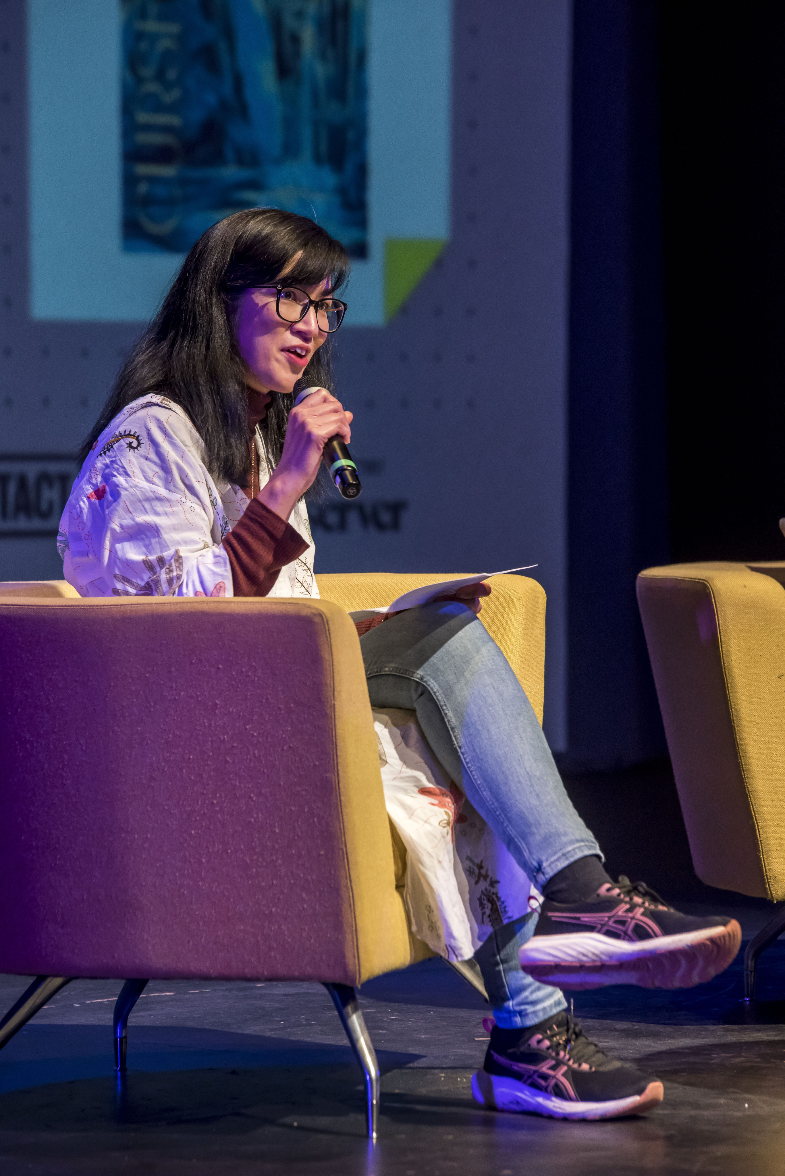 Eliza Chan speaking at the Manchester Literature Festival in 2025. The writer, who grew up in Scotland, went from rejecting her Chinese heritage to embracing it. Photo: Chris Payne