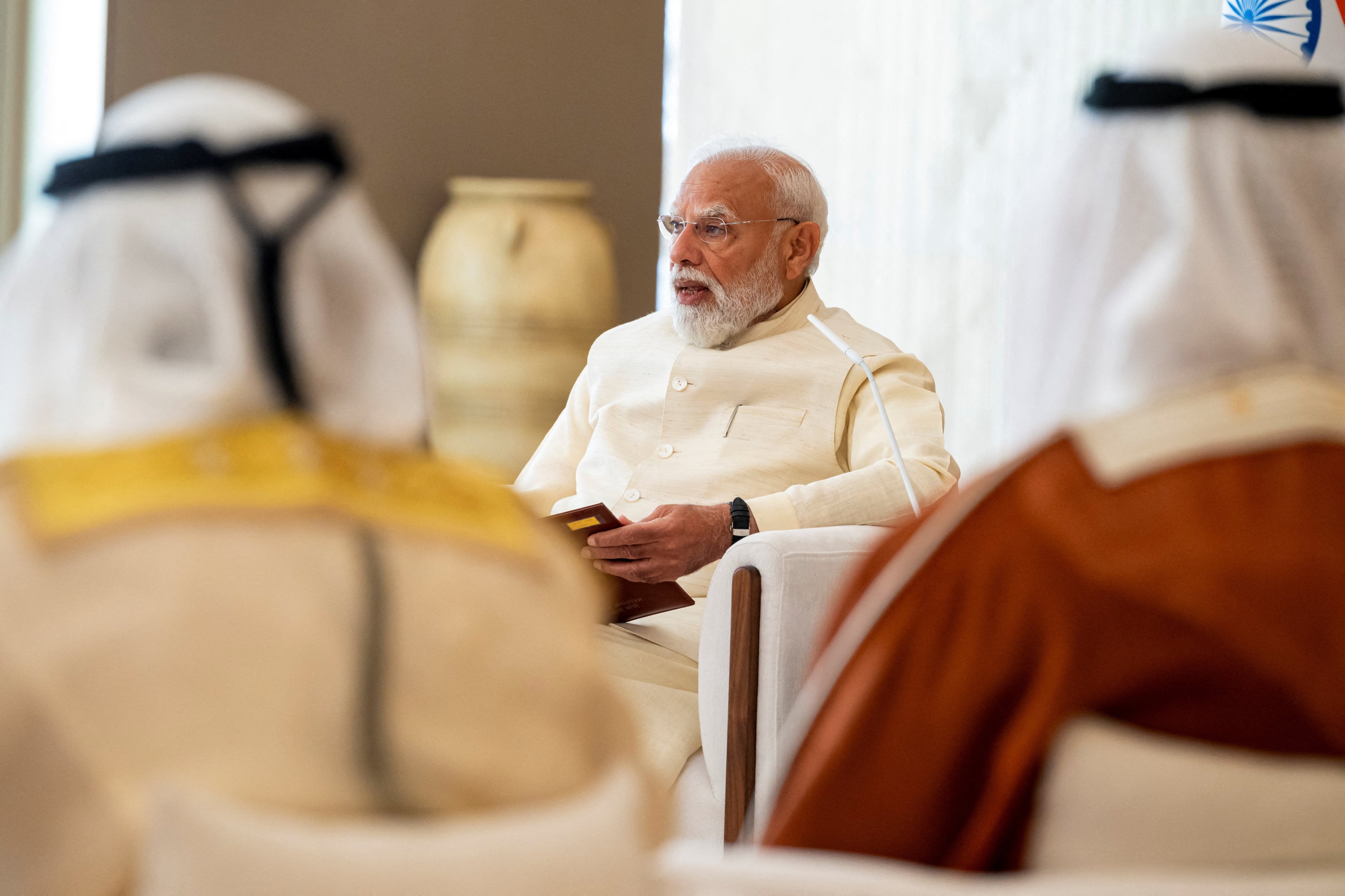 Indian Prime Minister Narendra Modi with UAE officials during an official visit reception in Abu Dhabi on Friday. Photo: UAE Presidential Court/Reuters