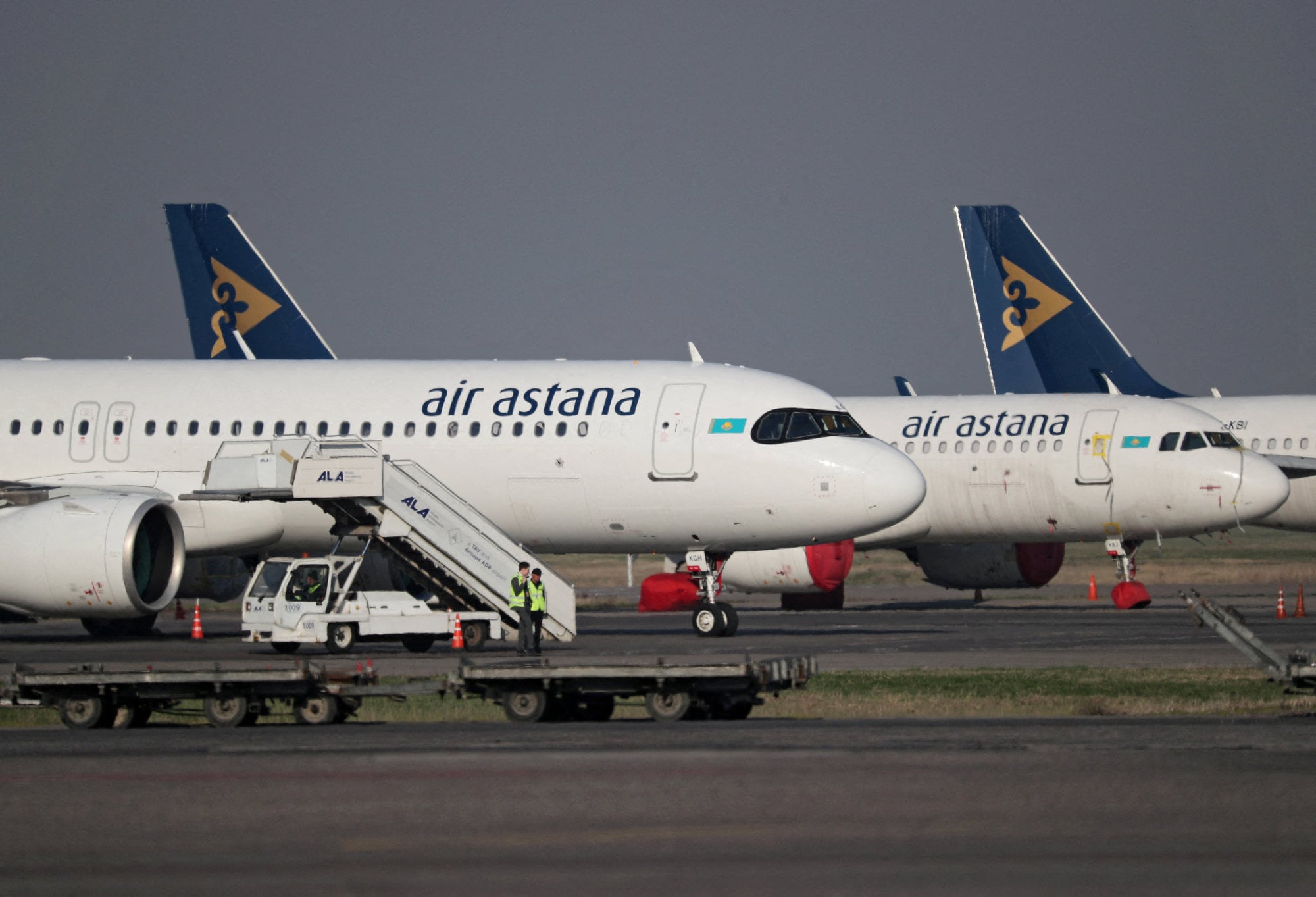 Air Astana planes parked at Almaty International Airport. Envoy Bauyrzhan Dosmanbetov says his government is in talks with major carriers over direct flights between the country and Hong Kong. Photo: Reuters Air Astana planes parked at Almaty International Airport. Envoy Bauyrzhan Dosmanbetov says his government is in talks with major carriers over direct flights between the country and Hong Kong. Photo: Reuters