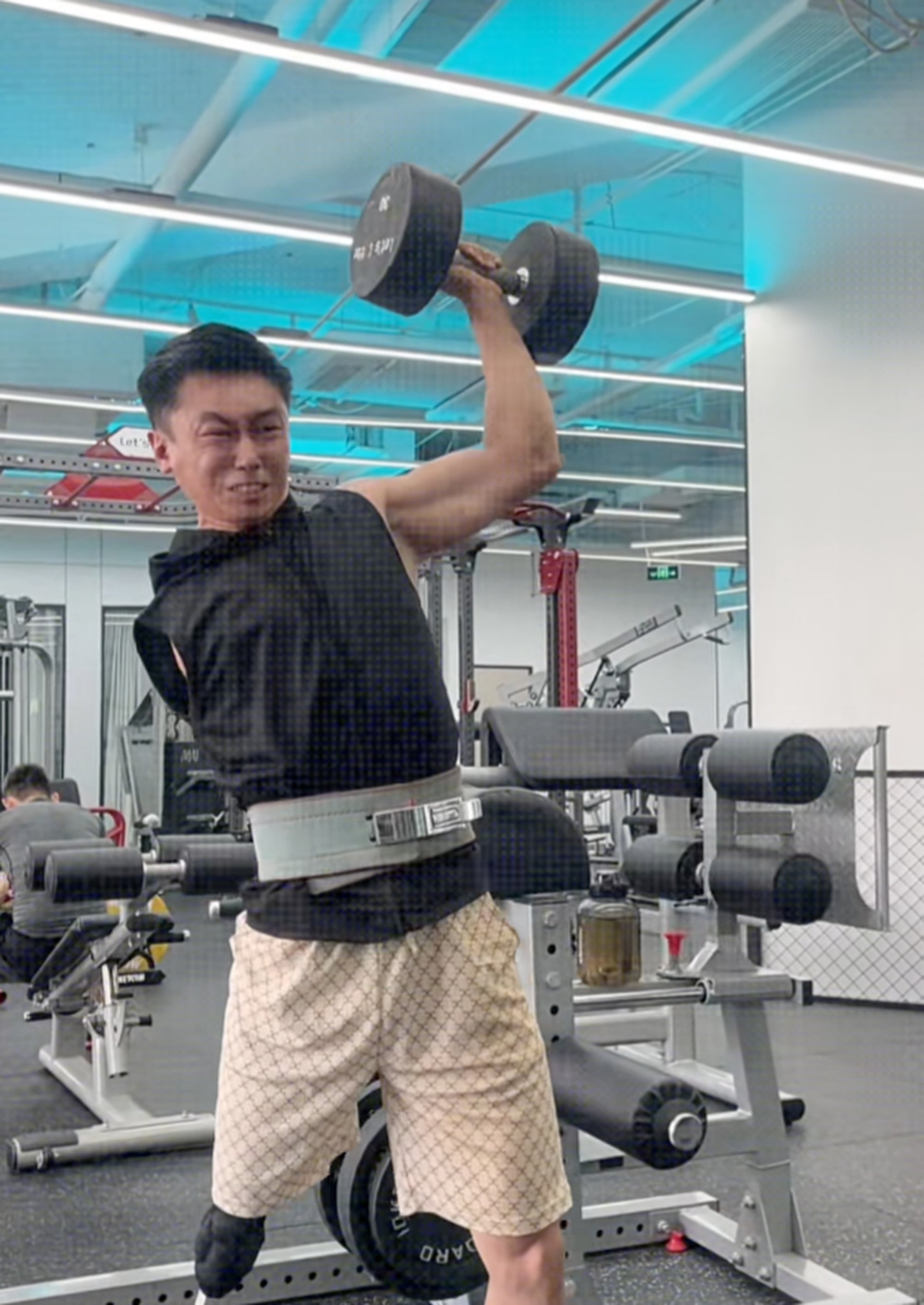 Liu in a determined mood as he lifts weights in the gymnasium. Photo: Douyin Liu in a determined mood as he lifts weights in the gymnasium. Photo: Douyin