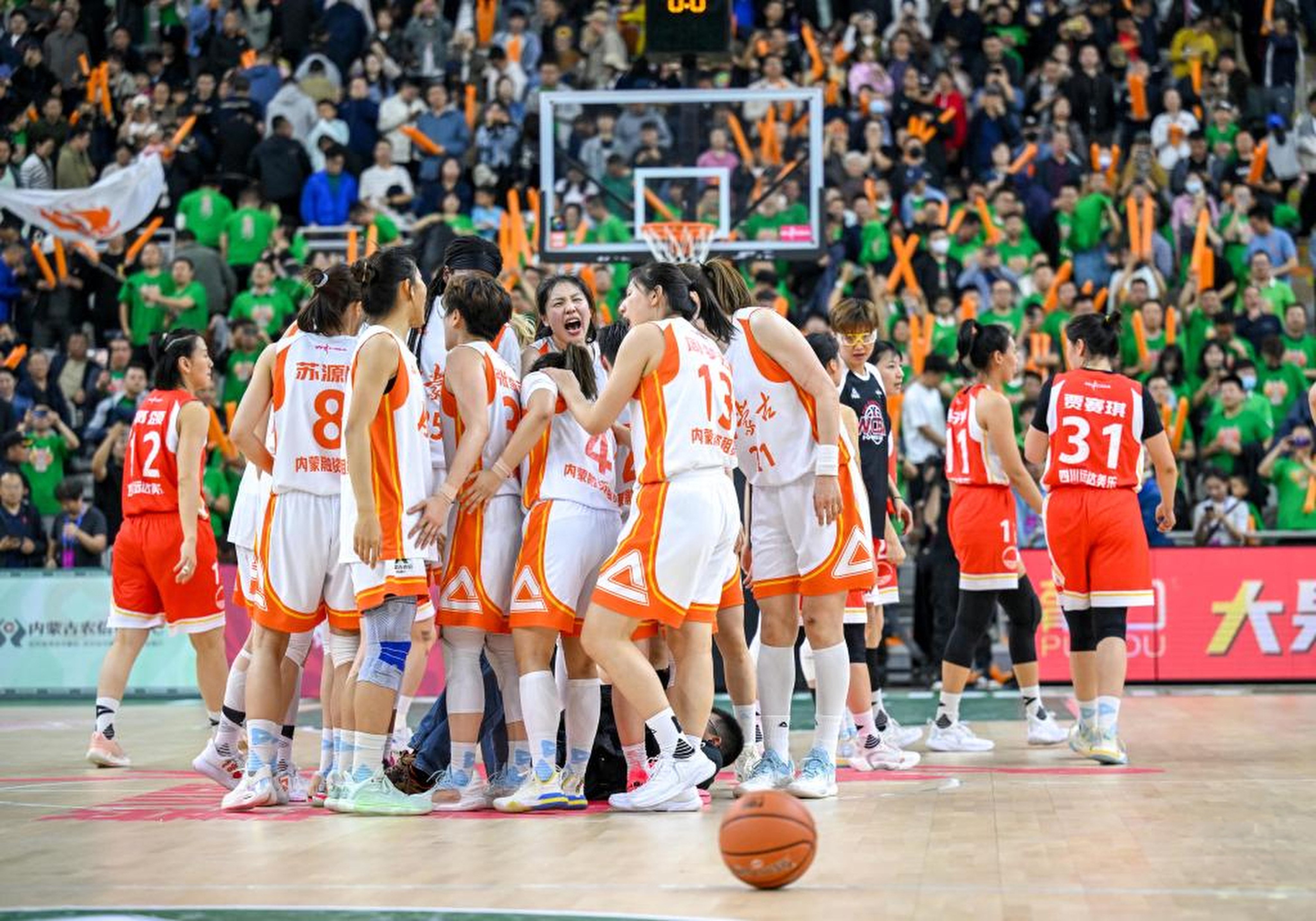 Inner Mongolia players celebrate after Game 2 of the Women’s Chinese Basketball Association finals against Sichuan on April 13, 2024. Photo: Xinhua