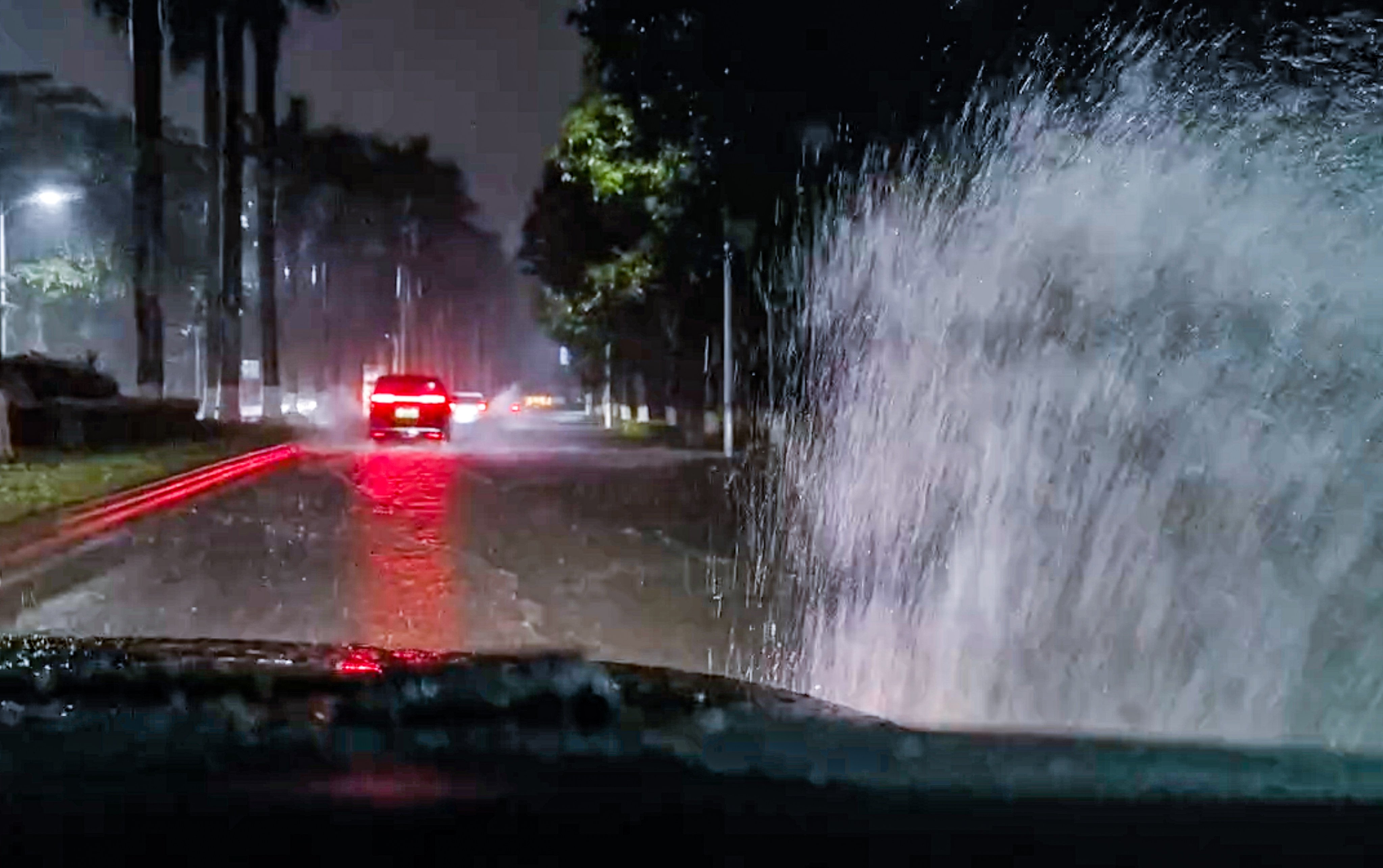 Dashcam footage of San Tin Highway near Mai Po shows vehicles splashing through water about 20cm deep. Photo: Handout