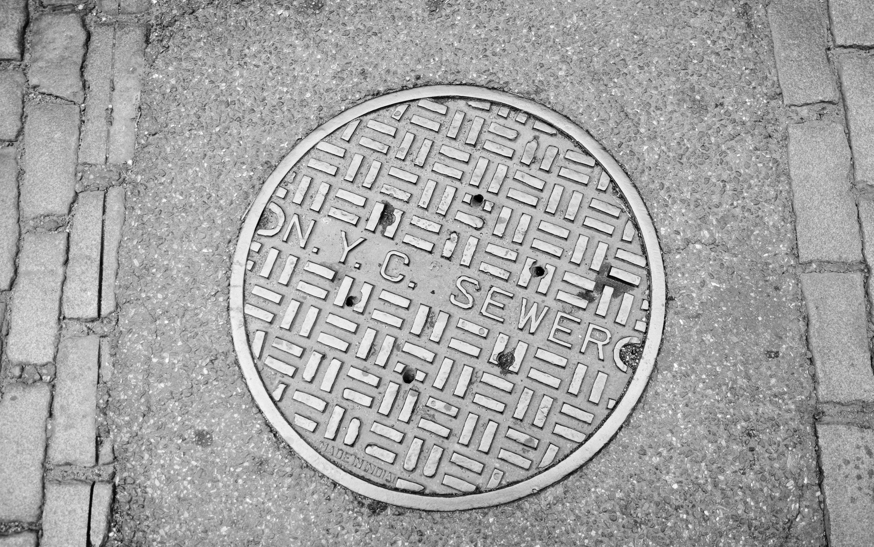 A 56-year-old woman died after she fell into an open manhole in New York. Photo illustration: TNS