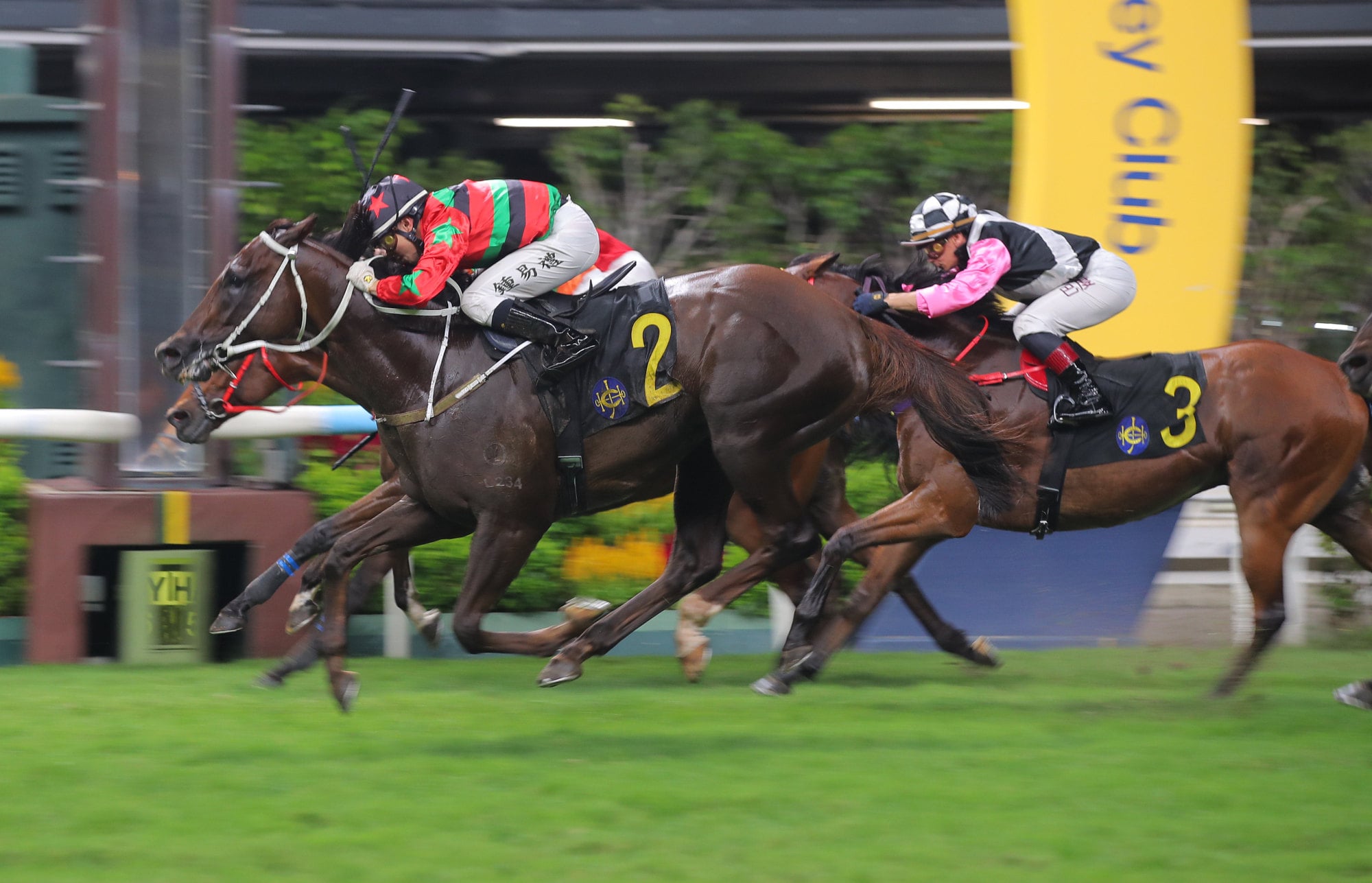 Tycoon Resources, ridden by Angus Chung, scores on the line at Happy Valley.