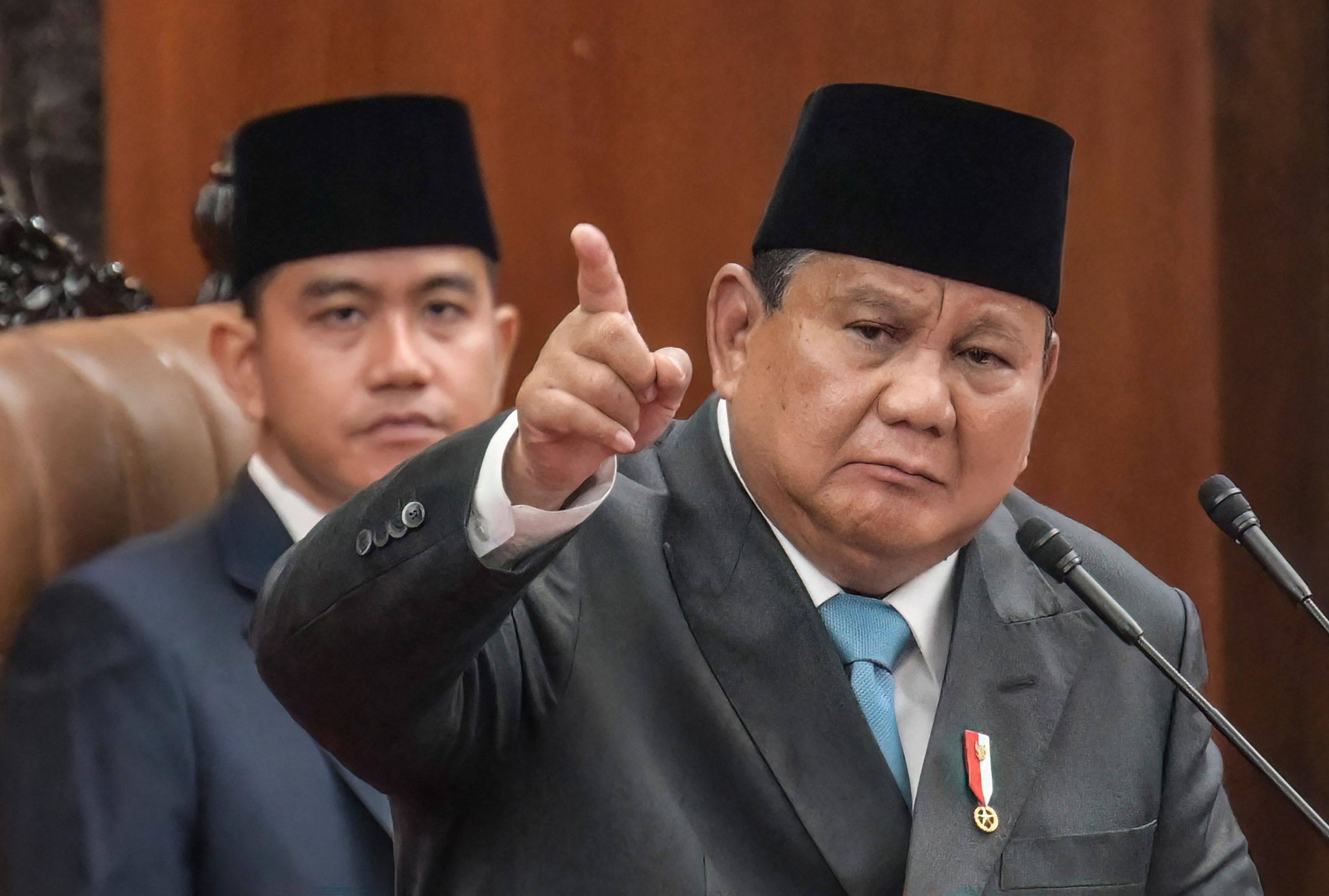 Indonesian President Prabowo Subianto delivers a speech to lawmakers as Vice-President Gibran Rakabuming Raka looks on at the parliament building in Jakarta on Wednesday. Photo: AFP