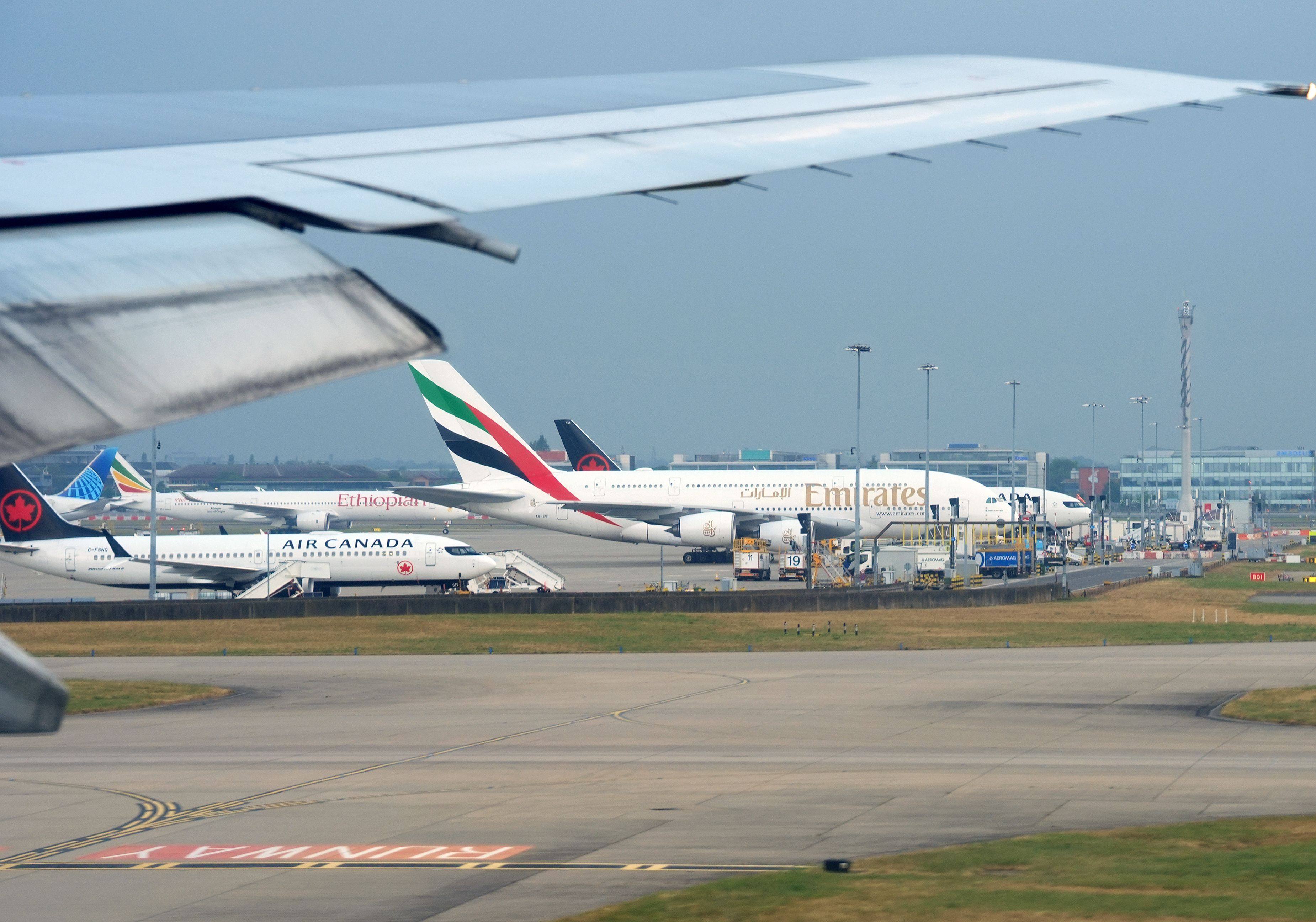 Planes stand on the tarmac at Heathrow Airport Terminal 5 as concerns grow over jet fuel supplies linked to the Iran war. Photo: dpa