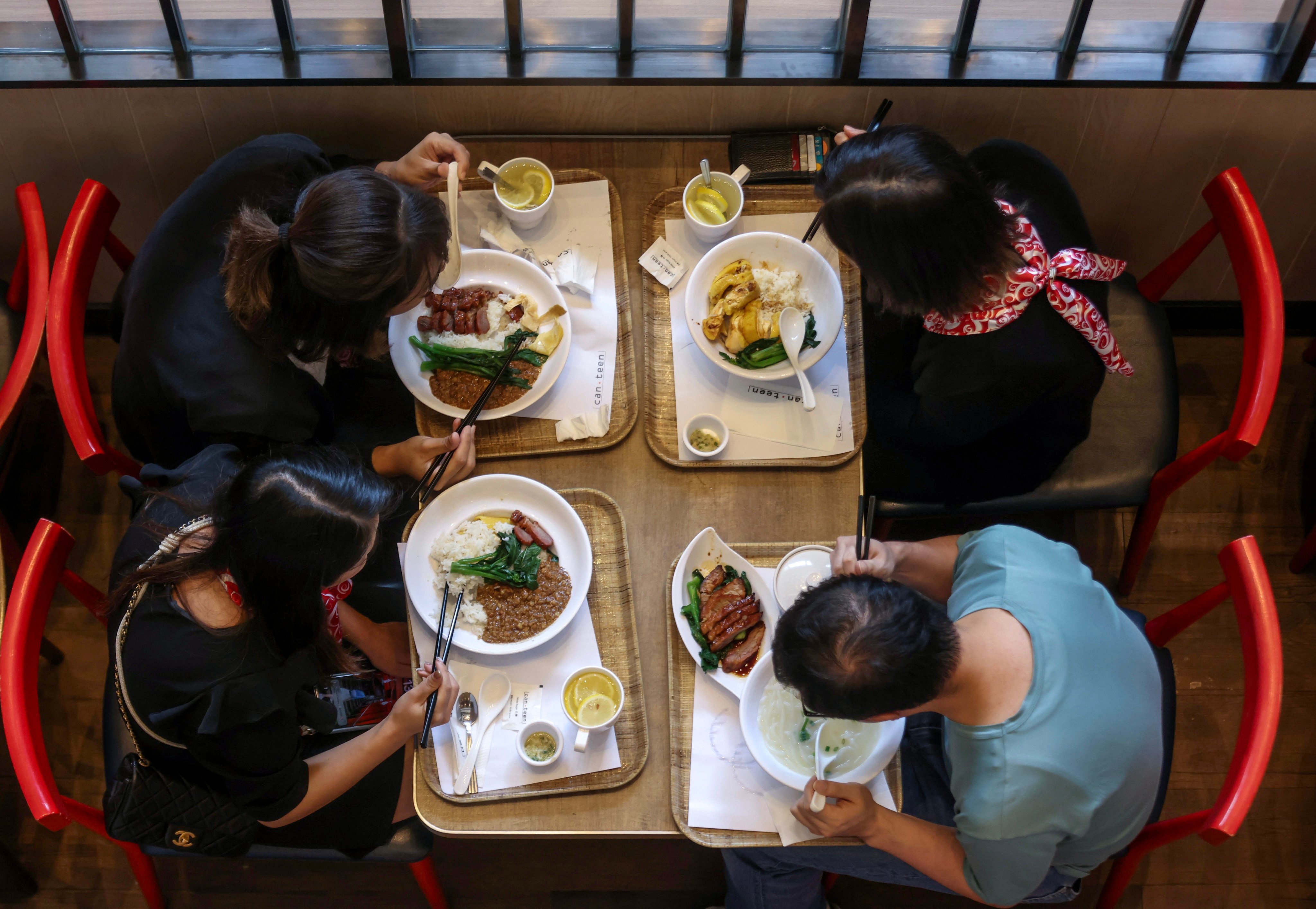 Diners enjoy meals at the Queensway Plaza shopping mall in Admiralty, Hong Kong. Photo: Jonathan Wong