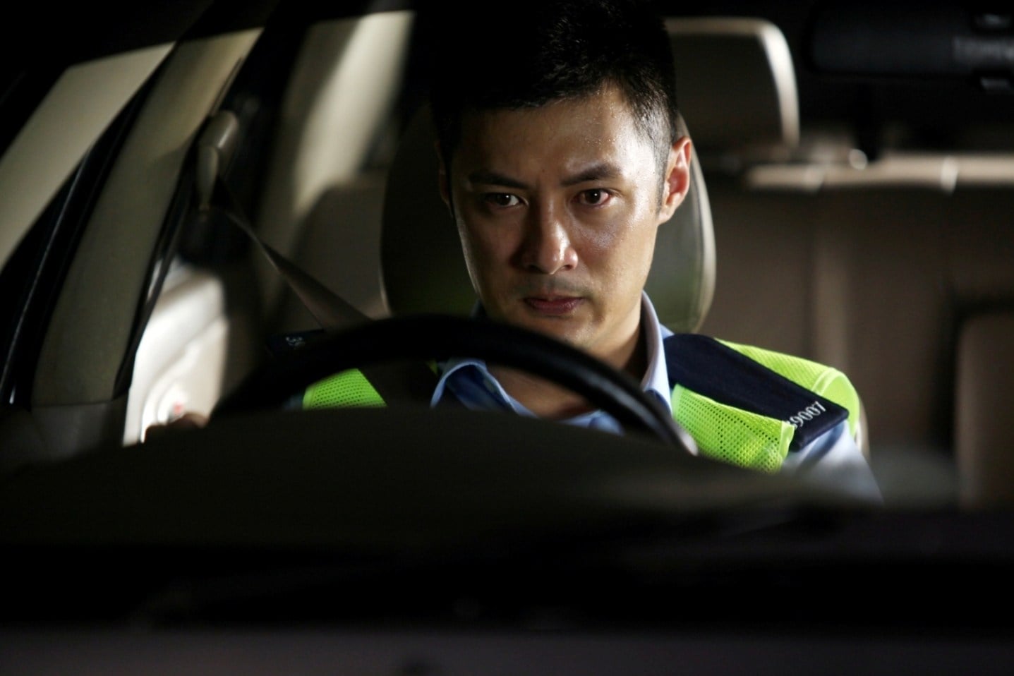 Shawn Yue in a still from Motorway (2012), a cops-and-robbers revenge tale that puts car handling at its centre and one of the titles on our list of the films featuring Hong Kong’s best car stunts.
