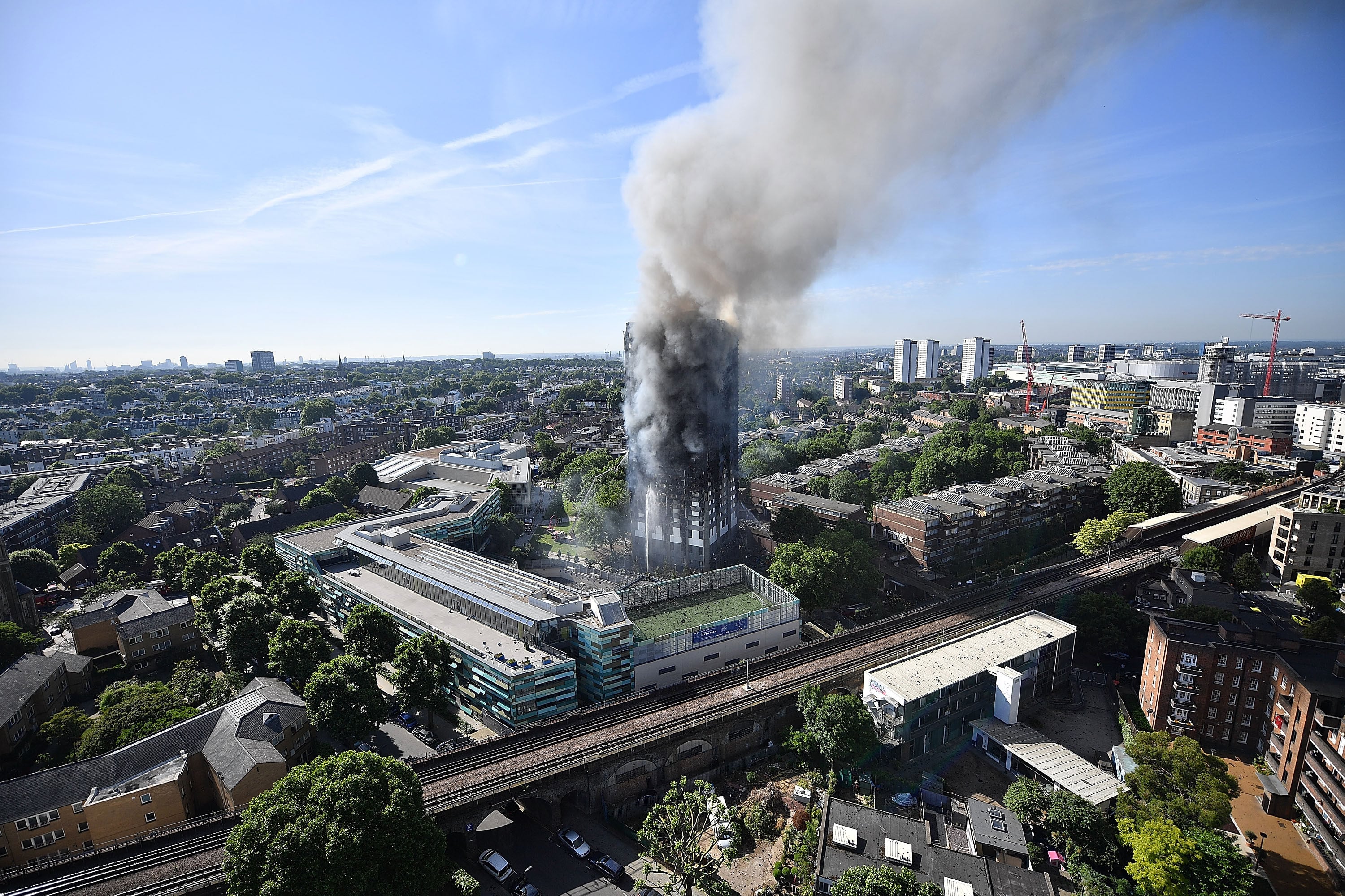 Grenfell Tower on fire in 2017. The block was in a deprived part of Britain's richest borough. Photo: Getty Images