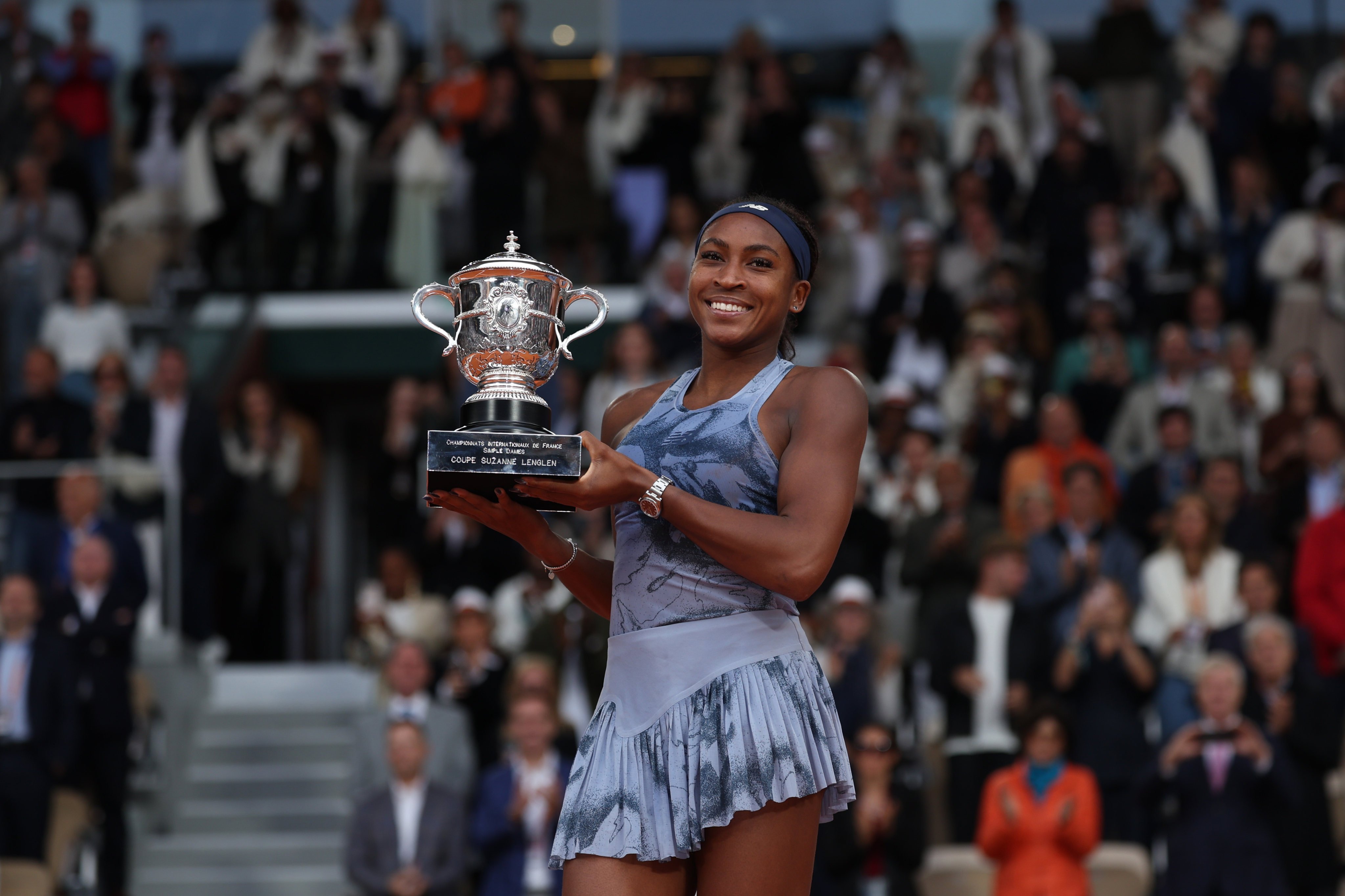 Coco Gauff of the US holds the French Open women’s singles trophy in June 2025. Photo: Handout