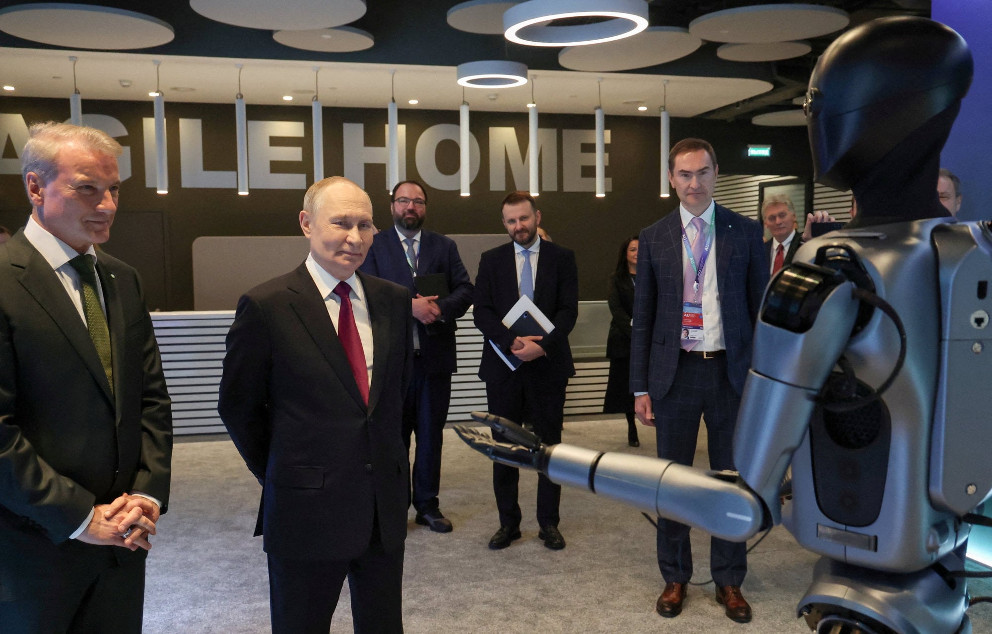 German Gref (left) joins Russian President Vladimir Putin at an AI exhibition in Moscow on November 19, 2025. Photo: Reuters German Gref (left) joins Russian President Vladimir Putin at an AI exhibition in Moscow on November 19, 2025. Photo: Reuters
