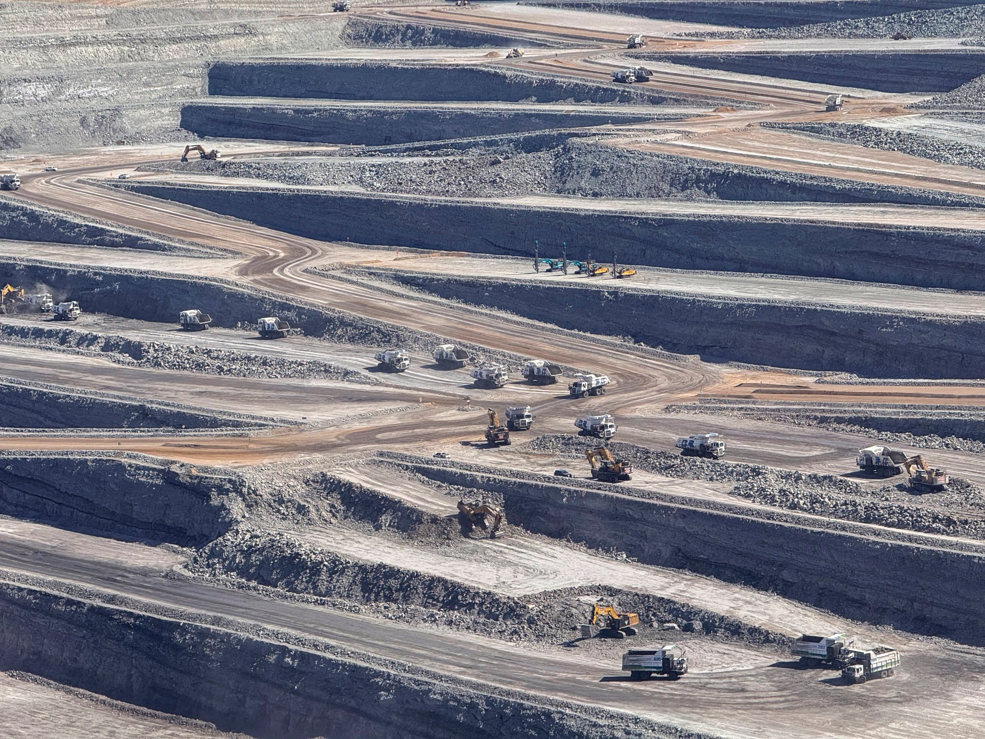 Electric, autonomous mining trucks operating at a colossal open-pit mine. Photo: Courtesy of Shanghai-headquartered Boonray Intelligent Technology Electric, autonomous mining trucks operating at a colossal open-pit mine. Photo: Courtesy of Shanghai-headquartered Boonray Intelligent Technology
