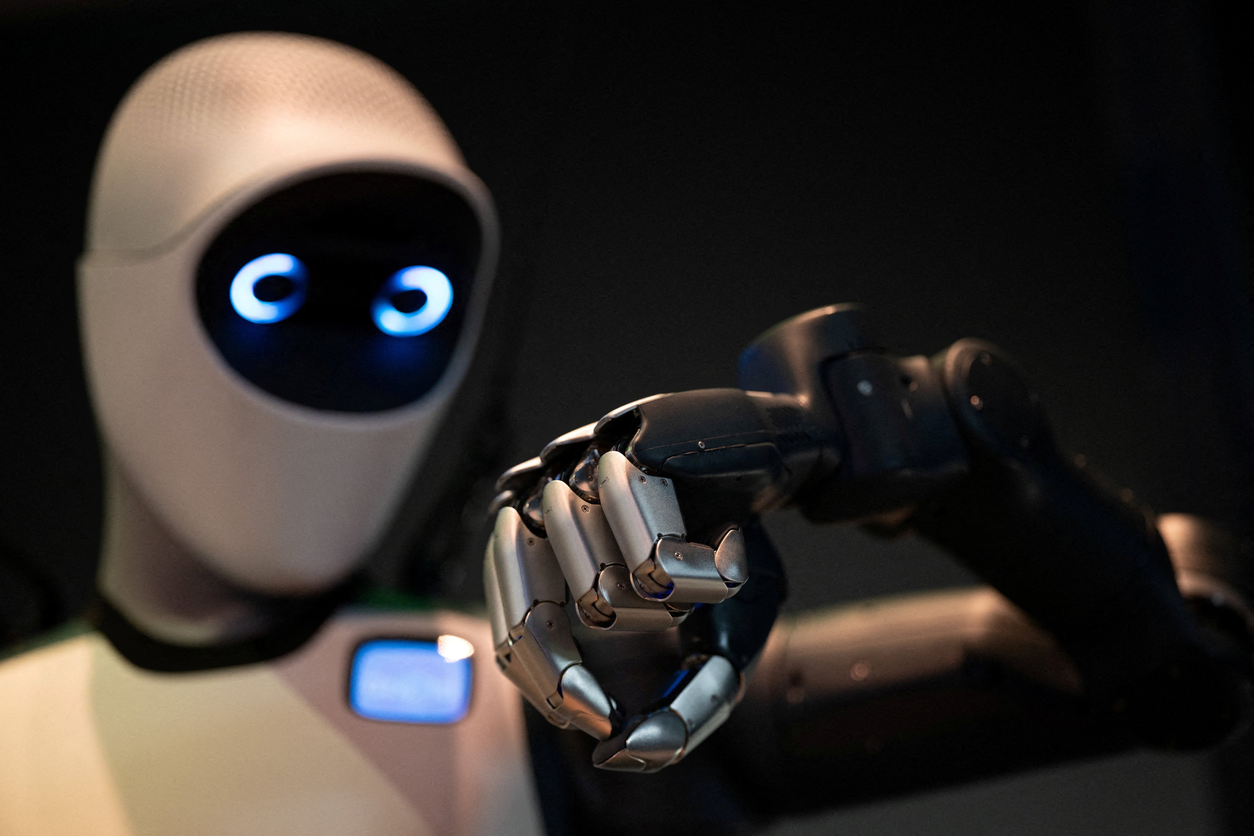 A robot demonstrates a task at the Nvidia booth during an AI conference in San Jose, California, on March 17. Photo: Reuters