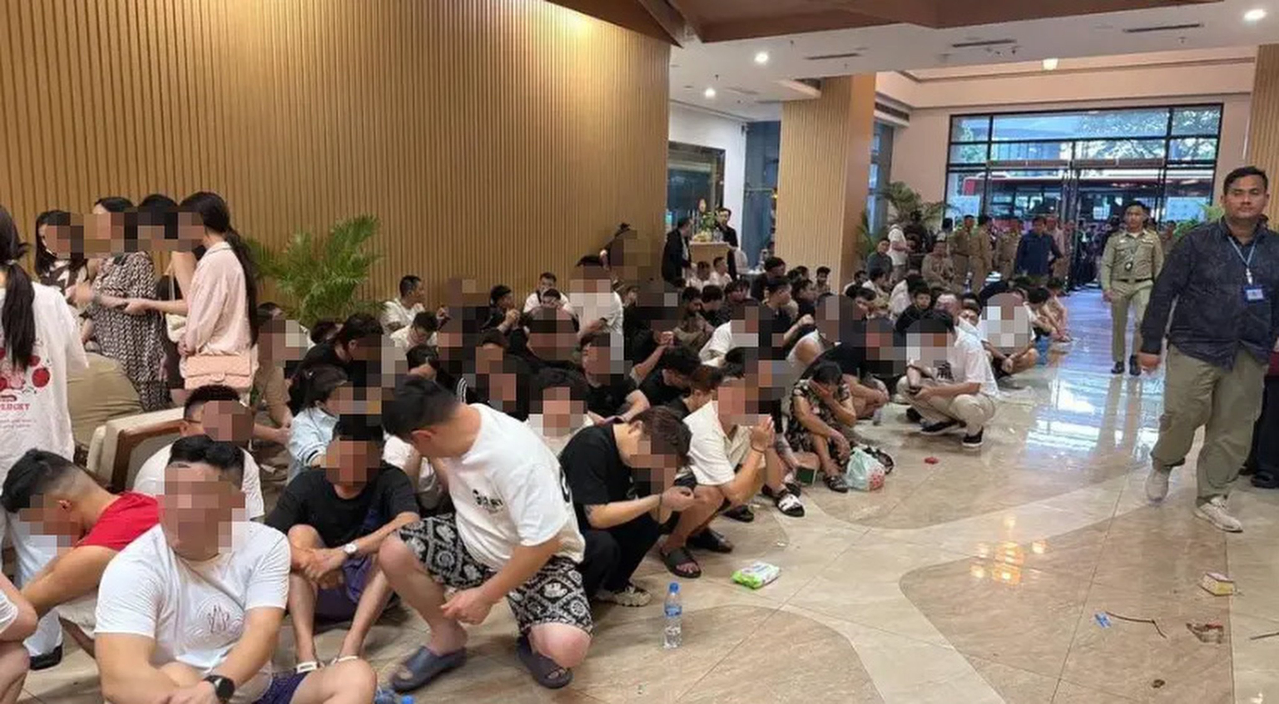 The detained individuals are of six nationalities and are accused of running online scam operations or residing in Cambodia illegally, local media report says. Photo: Sohu