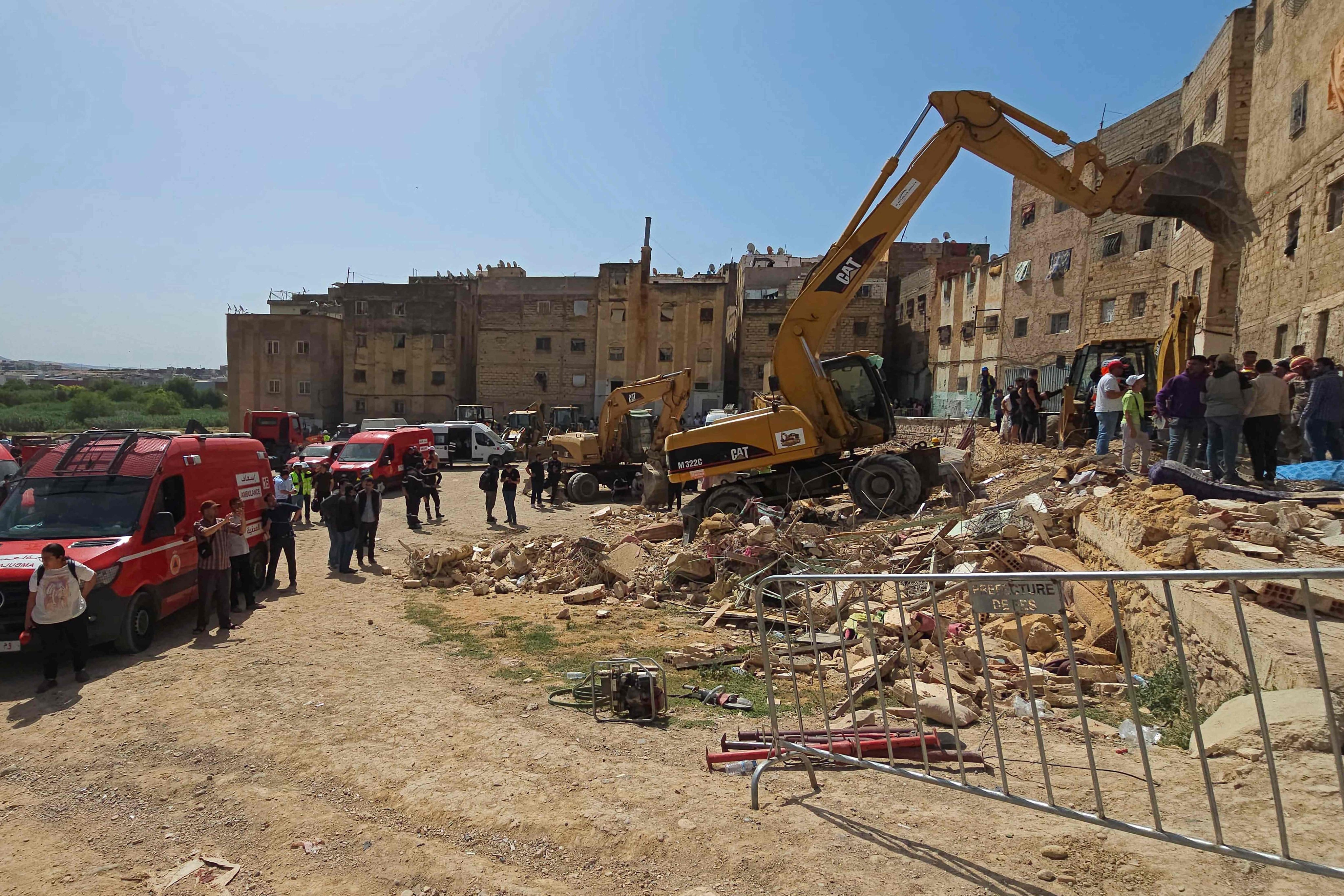 Rescuers on Thursday search through the rubble of a four-storey building that collapsed overnight in the Moroccan city of Fes. Photo: AFP
