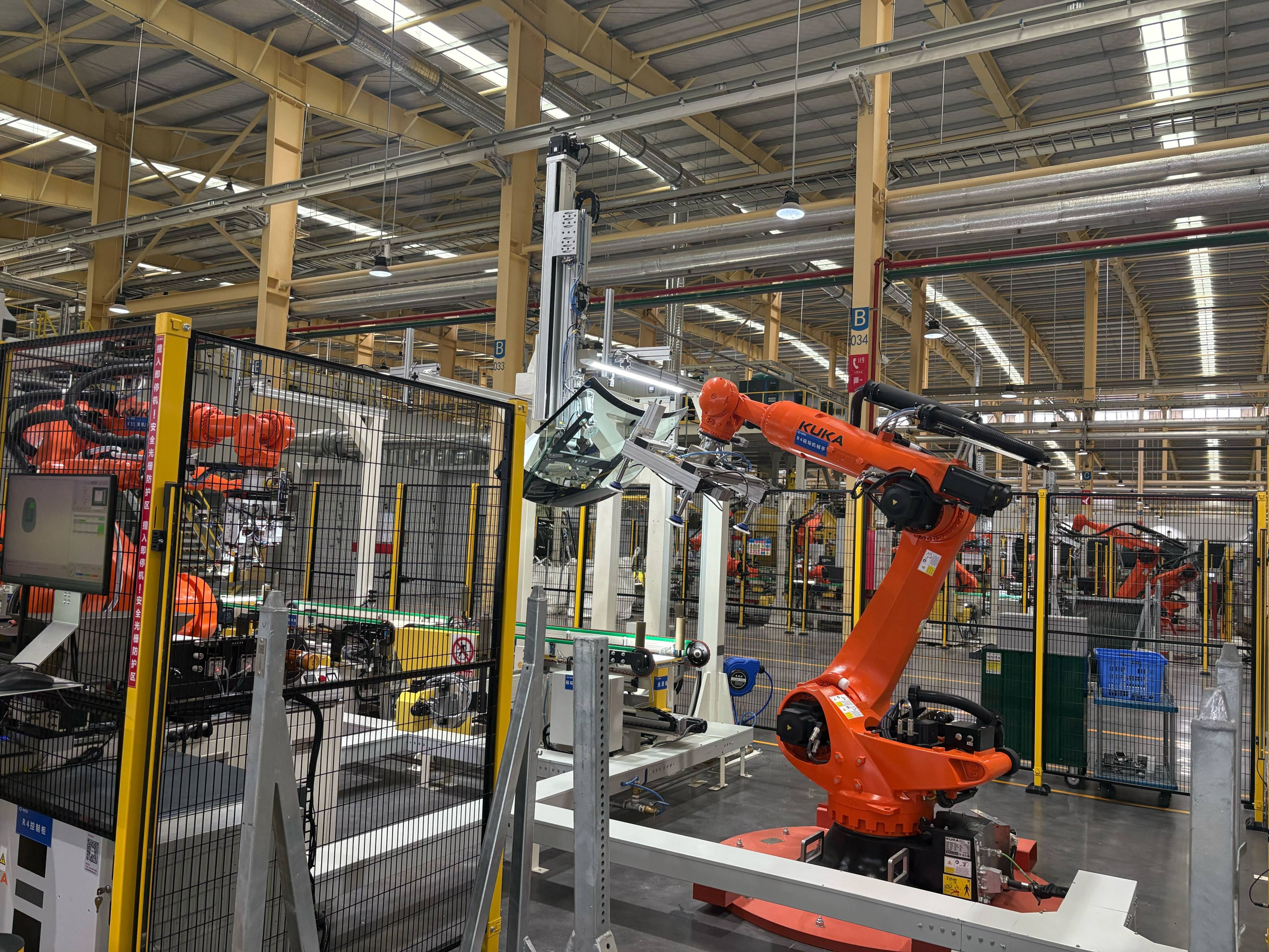 Intelligent equipment manufactures automotive glass at the Fuyao Glass production facility in Hefei, Anhui province, on May 19, 2026. Photo: Ann Cao