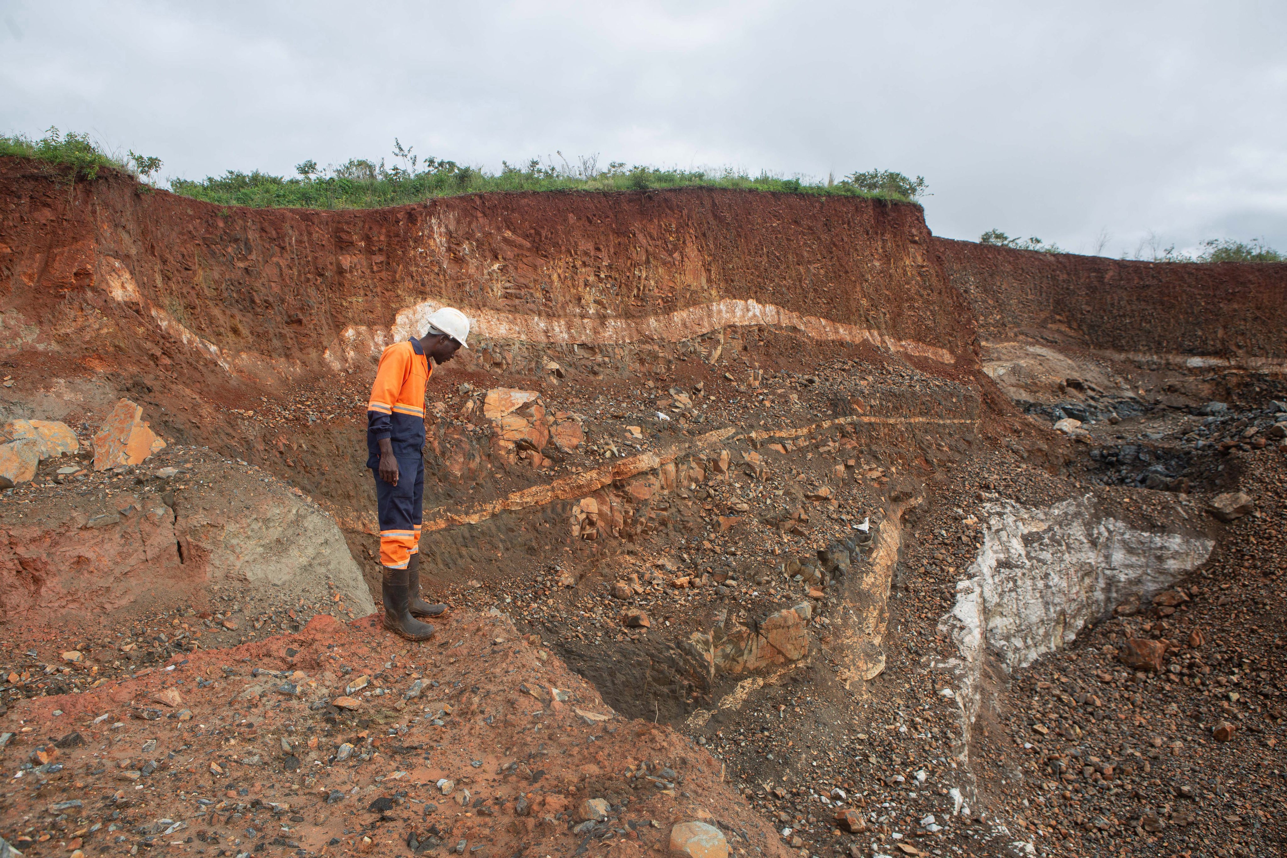 A worker inspects an open cast at the Arcadia lithium mine in Goromonzi, Zimbabwe. Photo: Getty Images