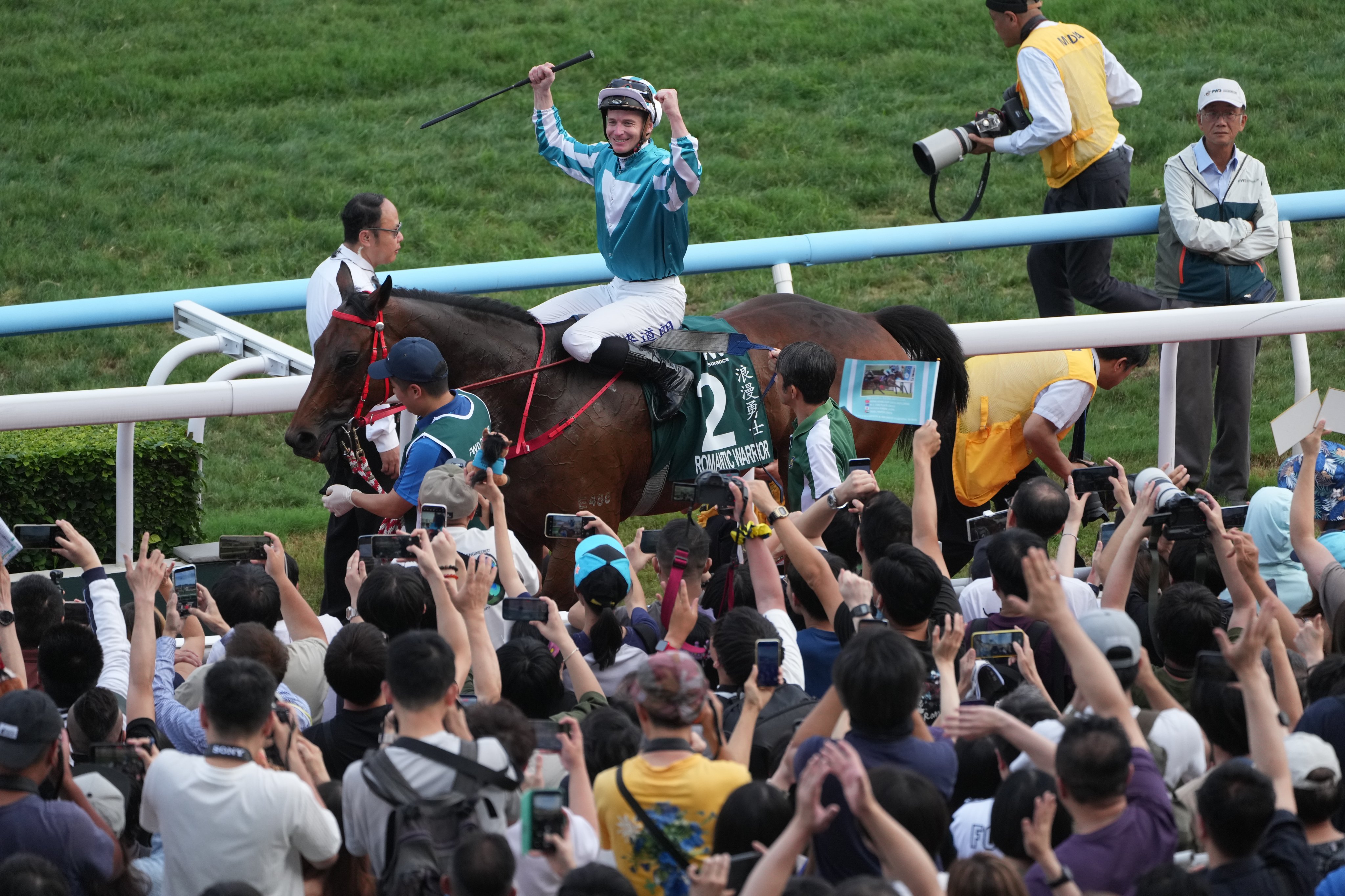 Romantic Warrior and James McDonald return after winning the Group One QEII Cup at Sha Tin. Photo: Sam Tsang