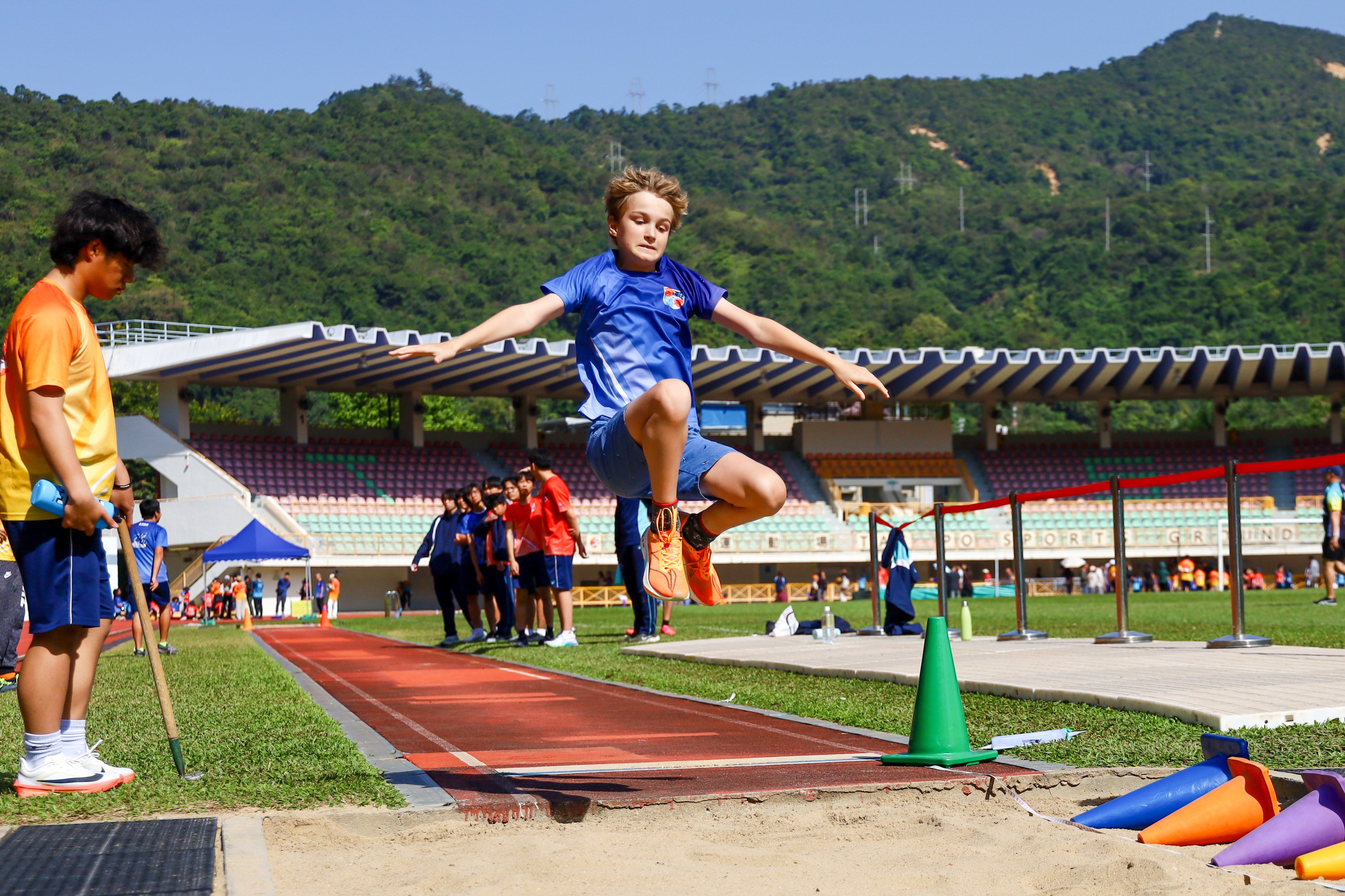 A student takes part in a jumping event at American School Hong Kong. Photo: Handout