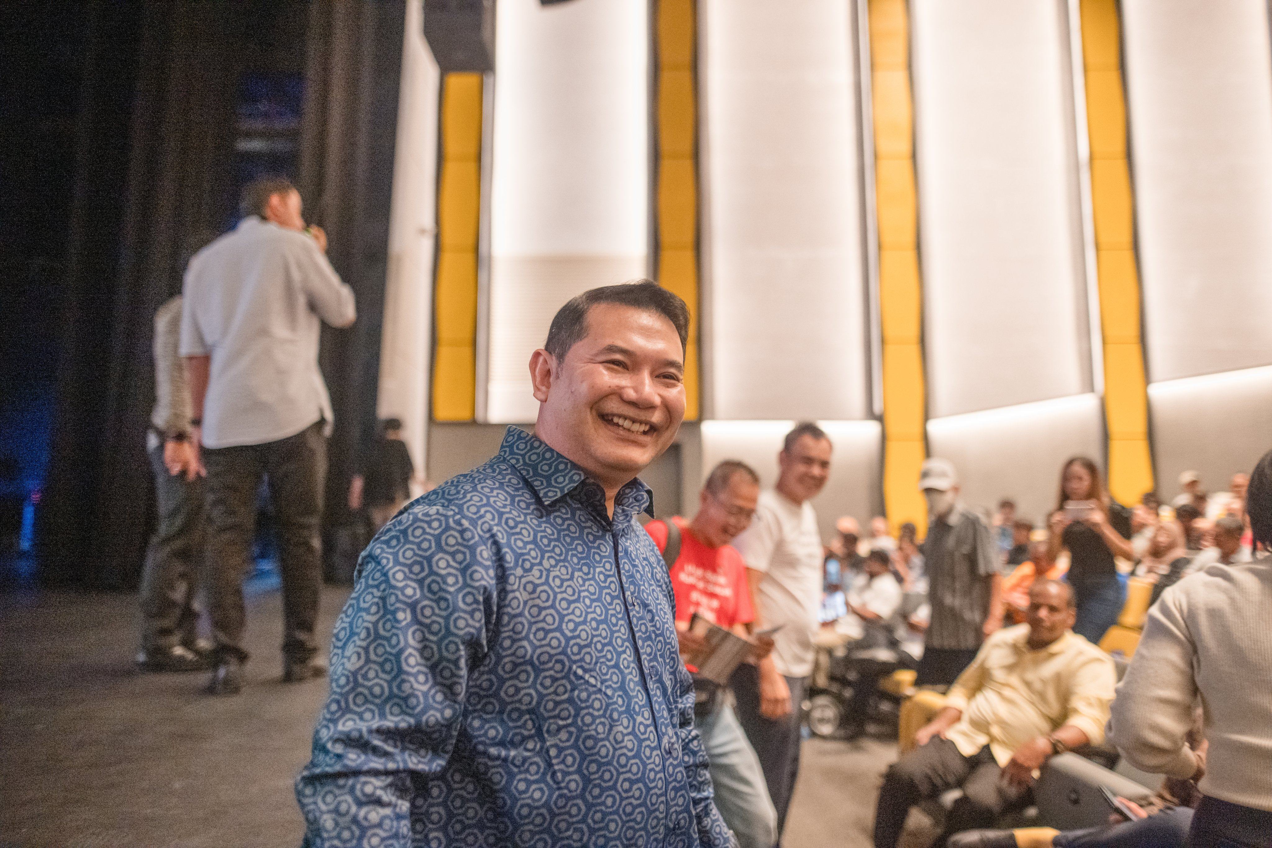 Rafizi Ramli greets attendees after announcing a takeover of Bersama on Sunday. Photo: X/Rafizi Ramli