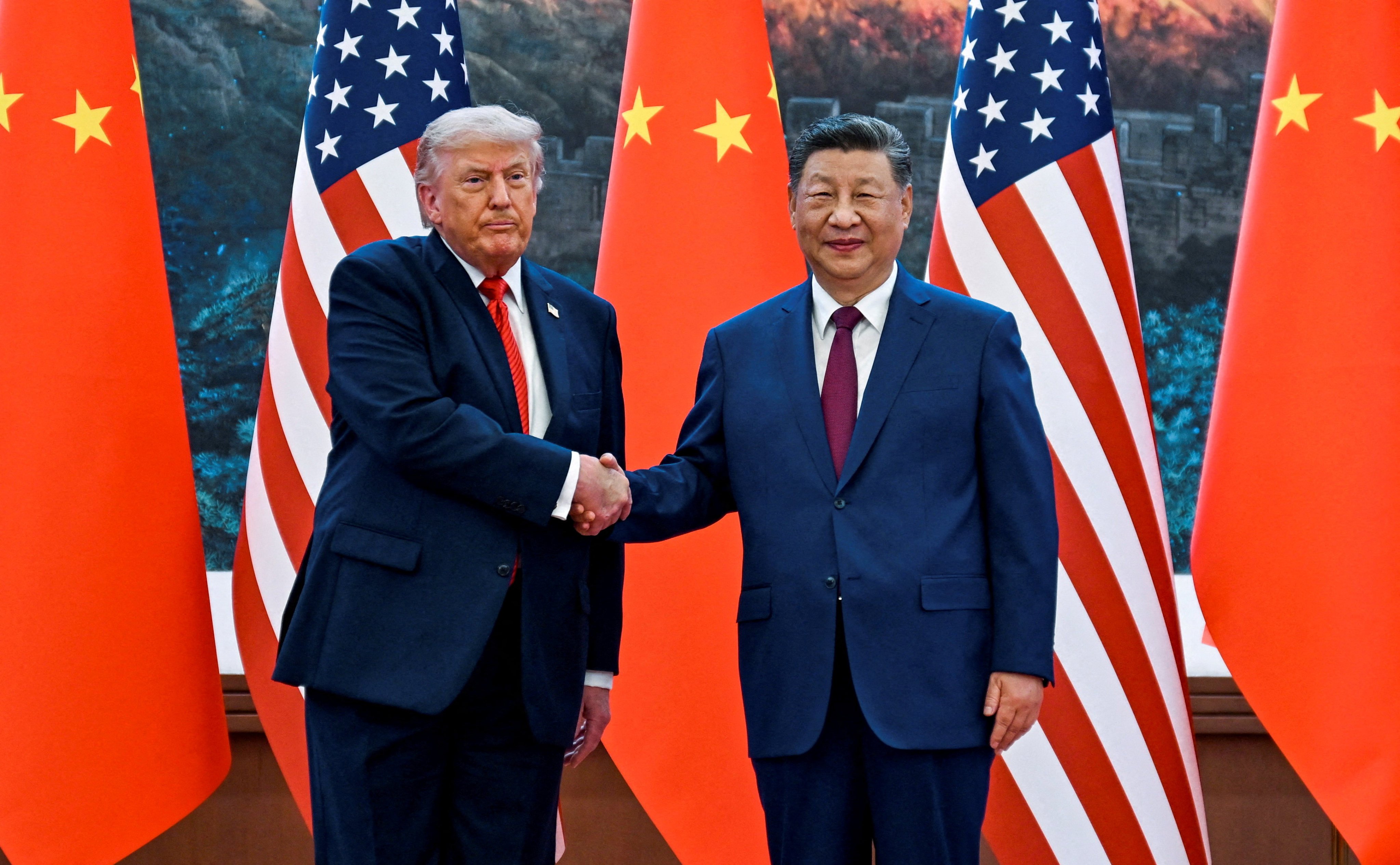 US President Donald Trump (left) shakes hand with China’s Xi Jinping at the Great Hall of the People in Beijing on May 14. Photo: Reuters