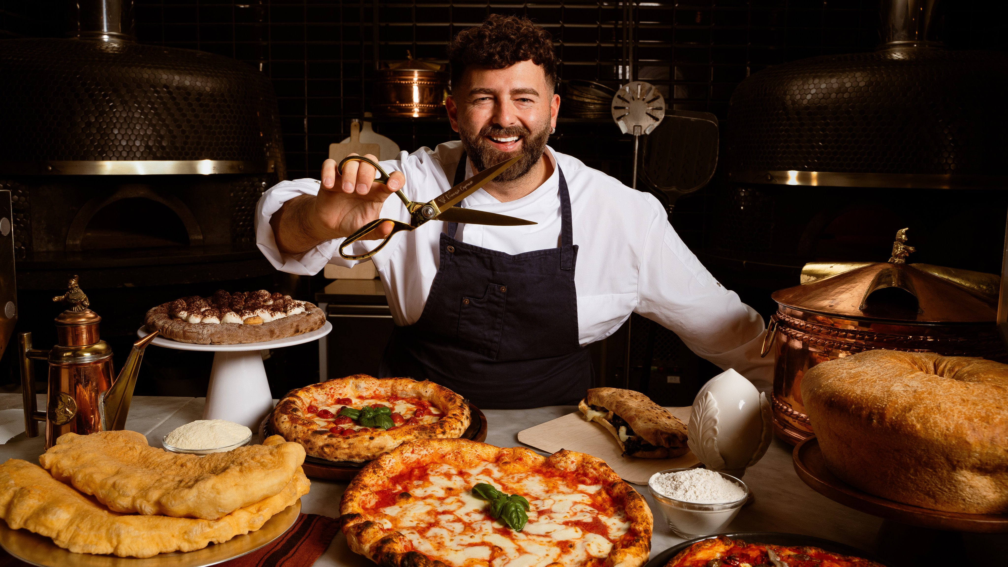 World-champion pizzaiolo Vincenzo Capuano brings his signature Nuvola dough to Wan Chai, featuring cloud-like crusts sliced with golden scissors. Photo: courtesy Vincenzo Capuano