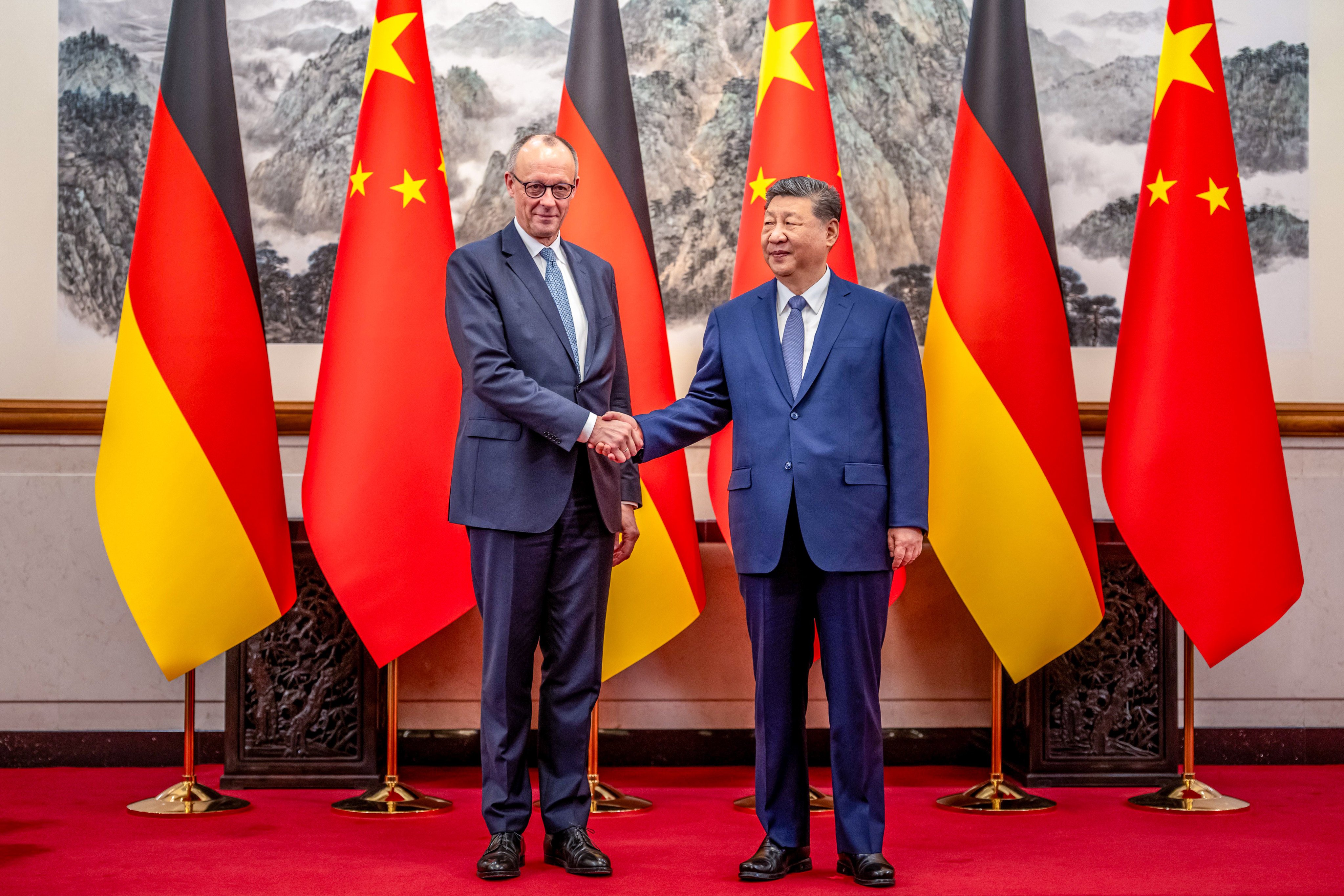 President Xi Jinping welcomes German Chancellor Friedrich Merz at the State Guest House in Beijing on February 25. Photo: DPA