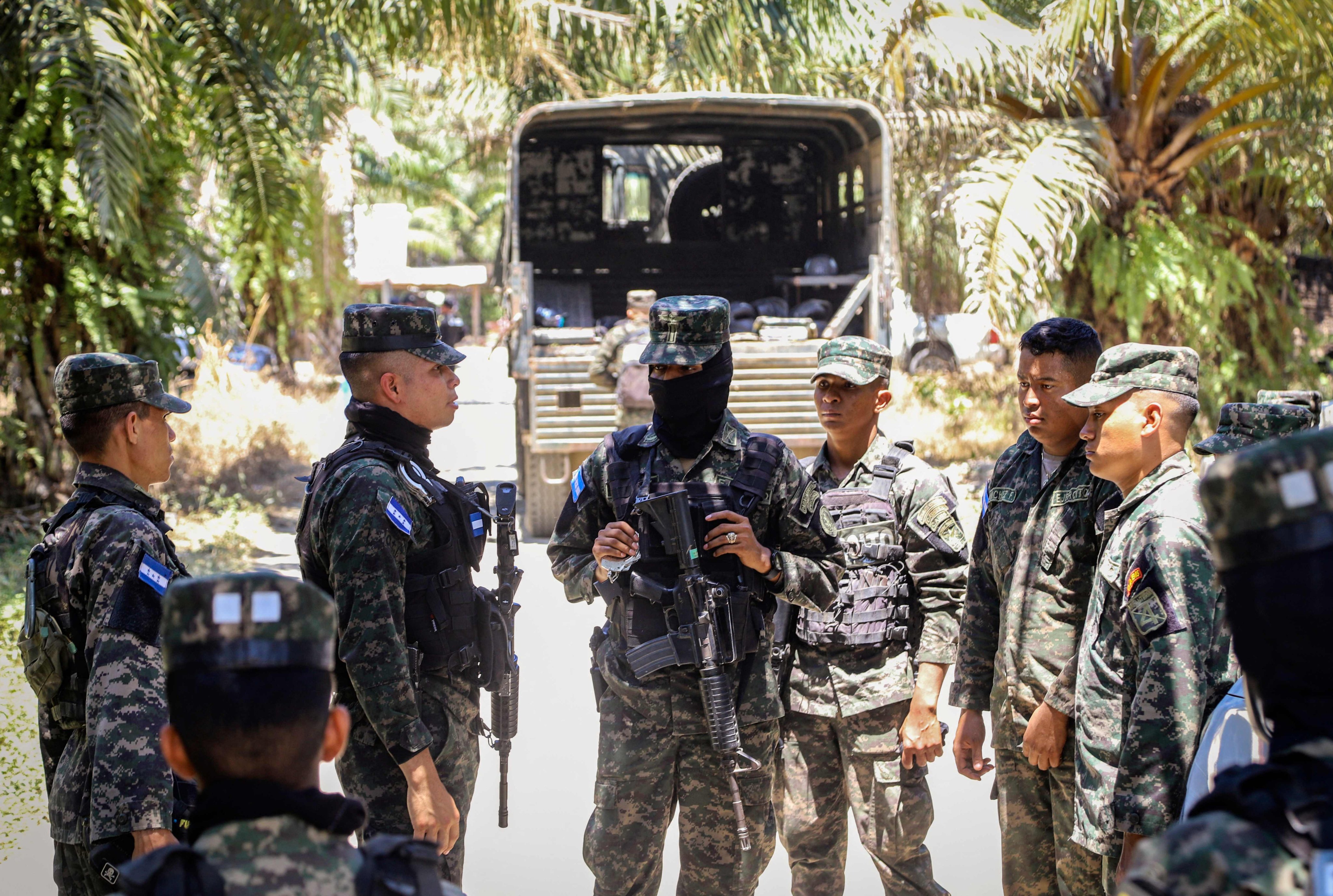 Army soldiers near the site of a shooting in Trujillo, Honduras on Thursday. Photo: AFP