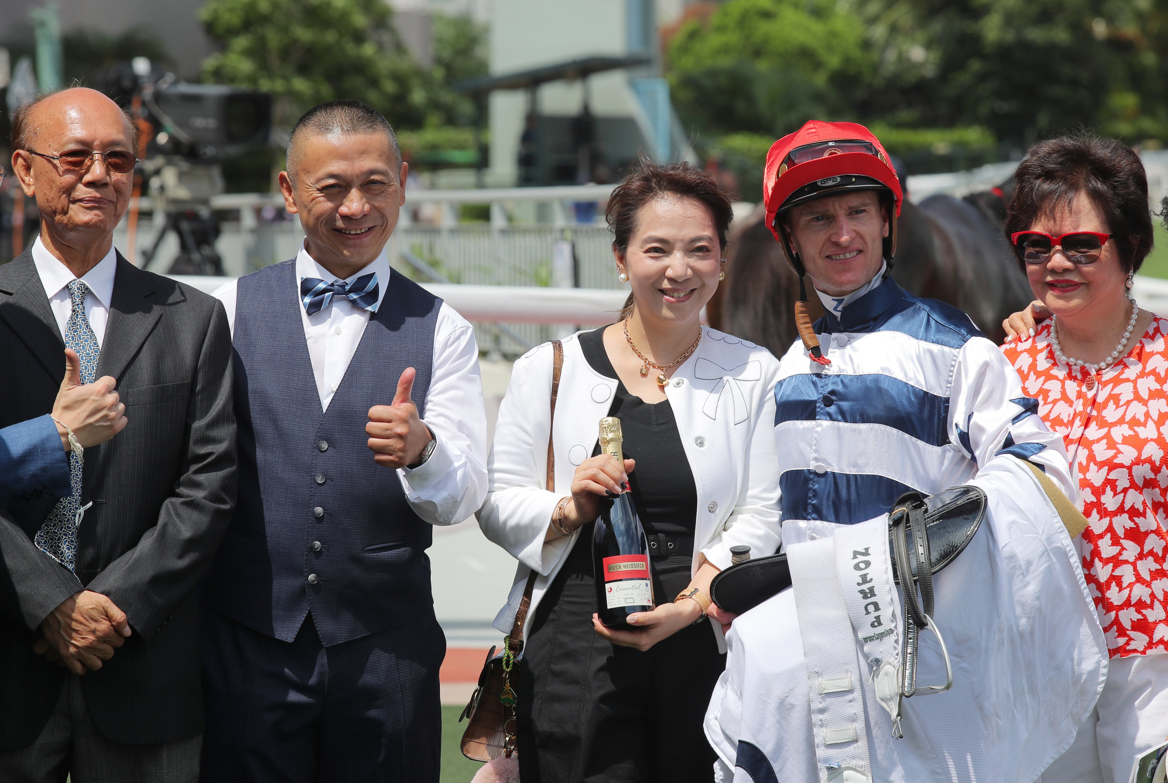Trainer Danny Shum (second left) celebrates Packing King’s winner. Photos: Kenneth Chan