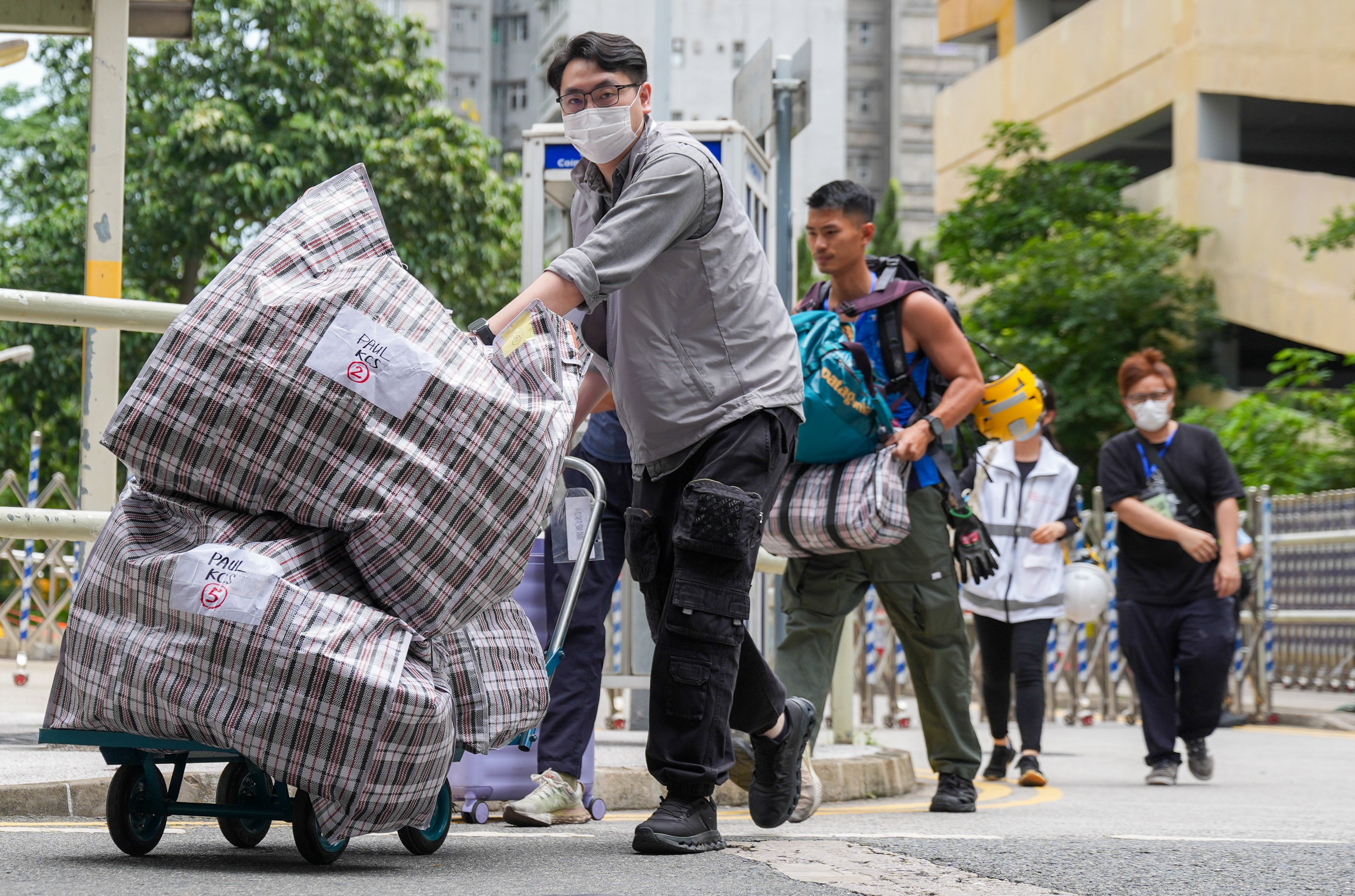 Wang Fuk Court residents return to their flats earlier this month. Photo: Eugene Lee