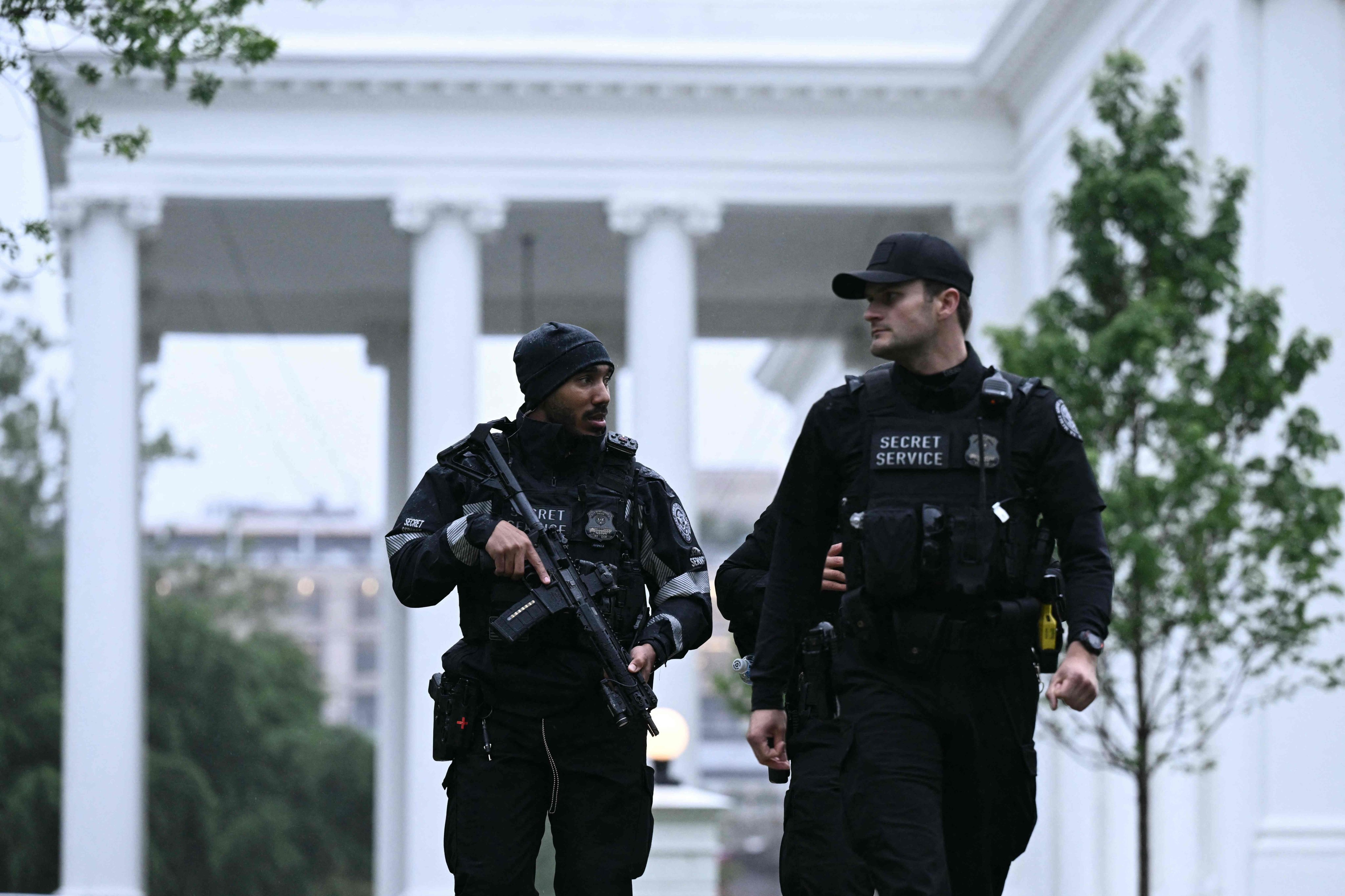 US Secret Service agents are seen after gunfire was reported near the White House on Saturday. Photo: AFP
