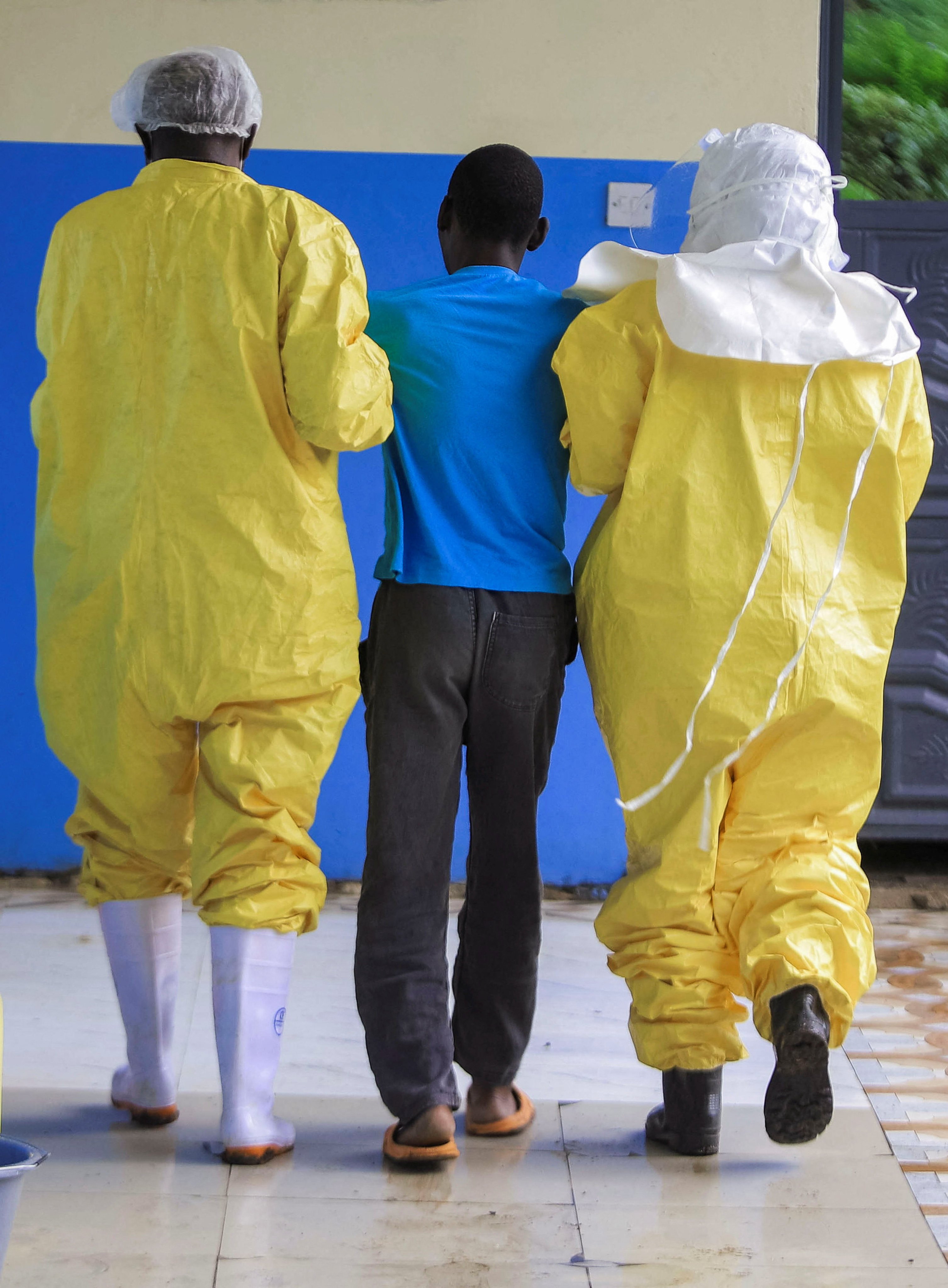 Congolese health workers receive a patient at a hospital on Thursday as authorities try to contain an Ebola outbreak in Rwampara, outside Bunia. Photo: Reuters