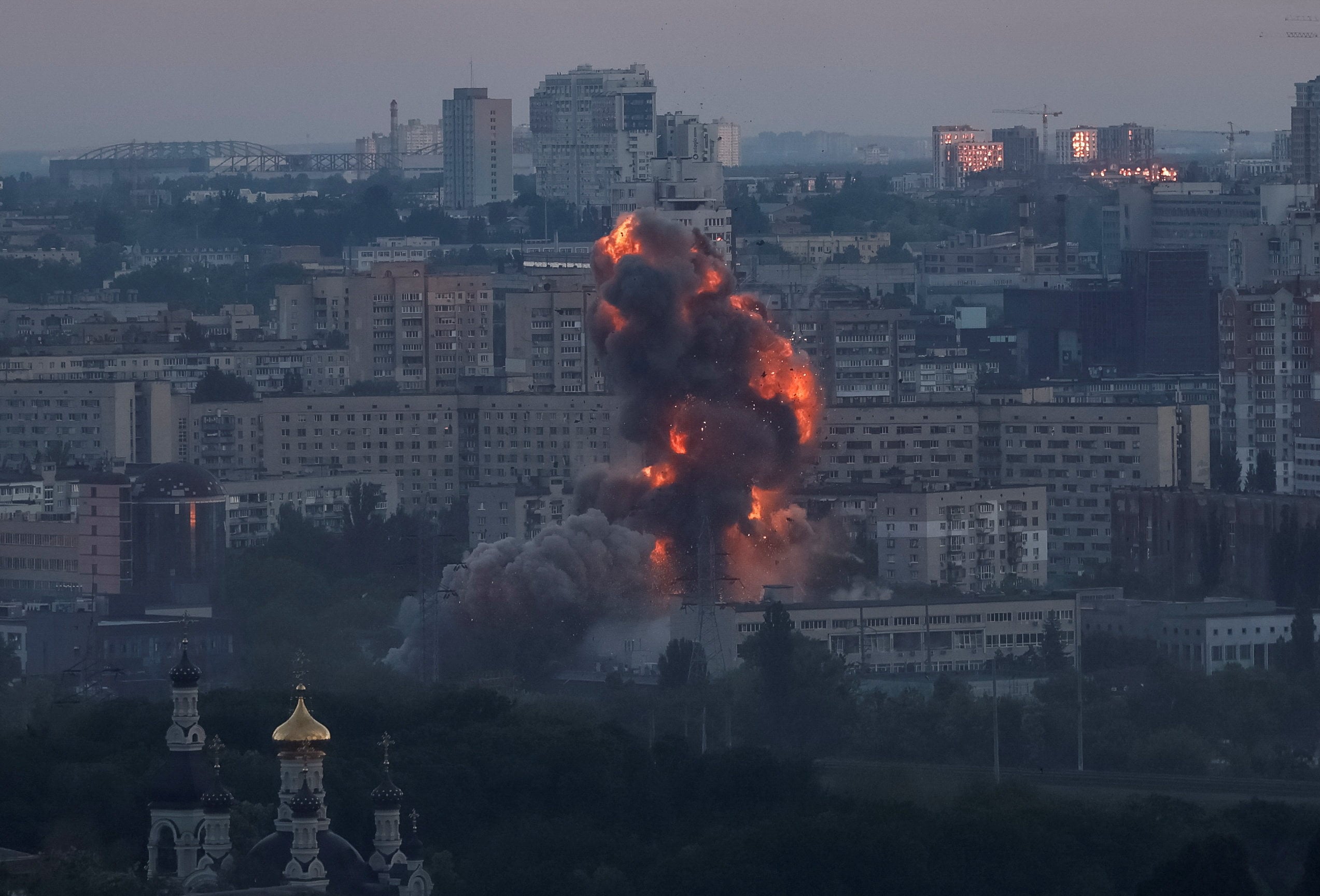Fire and smoke rise following an explosion during a huge Russian missile and drone strike on Kyiv, Ukraine, on Sunday. Photo: Reuters