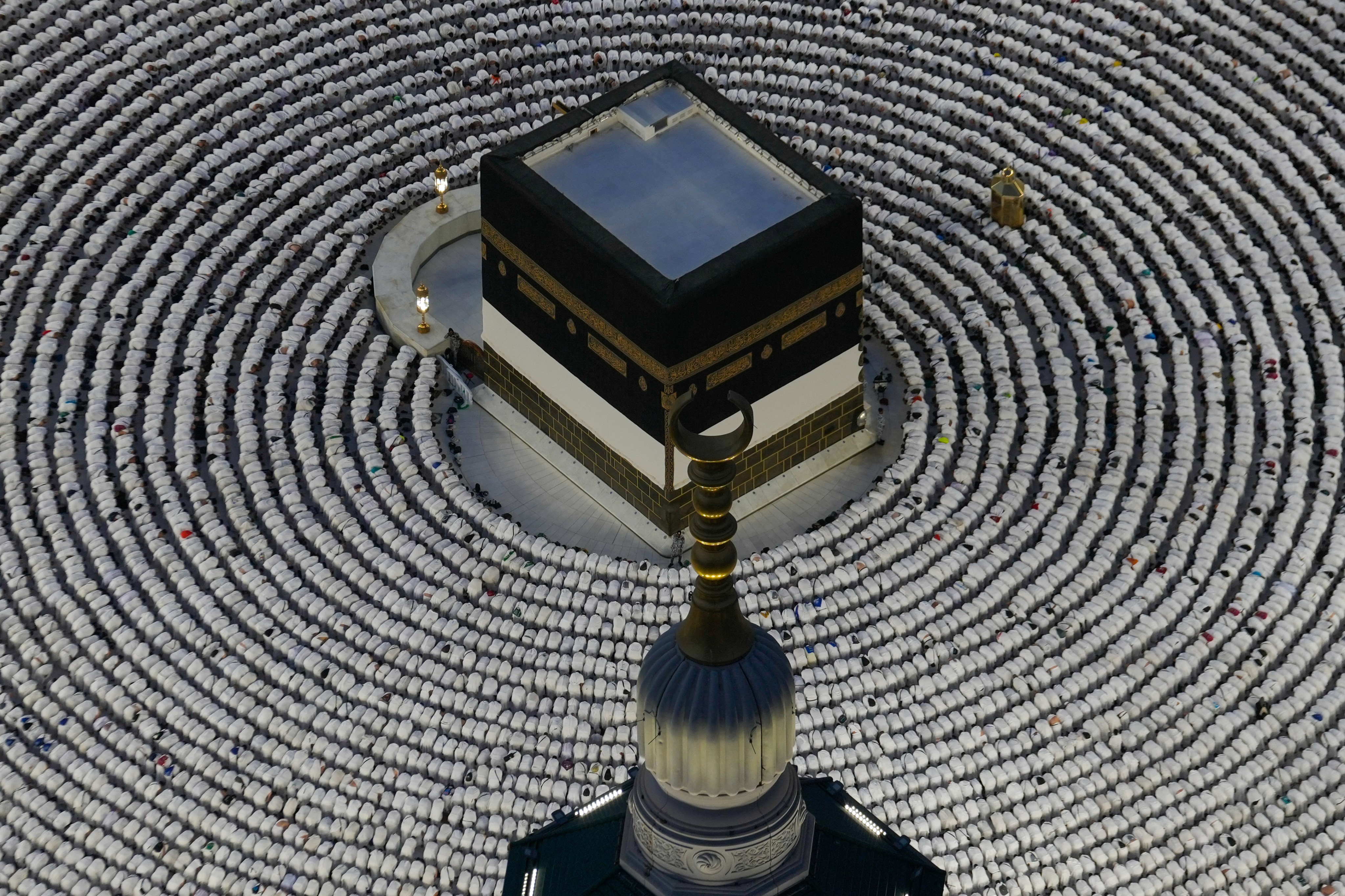 Pilgrims pray around the cube-shaped Kaaba in the Grand Mosque. Photo: AP