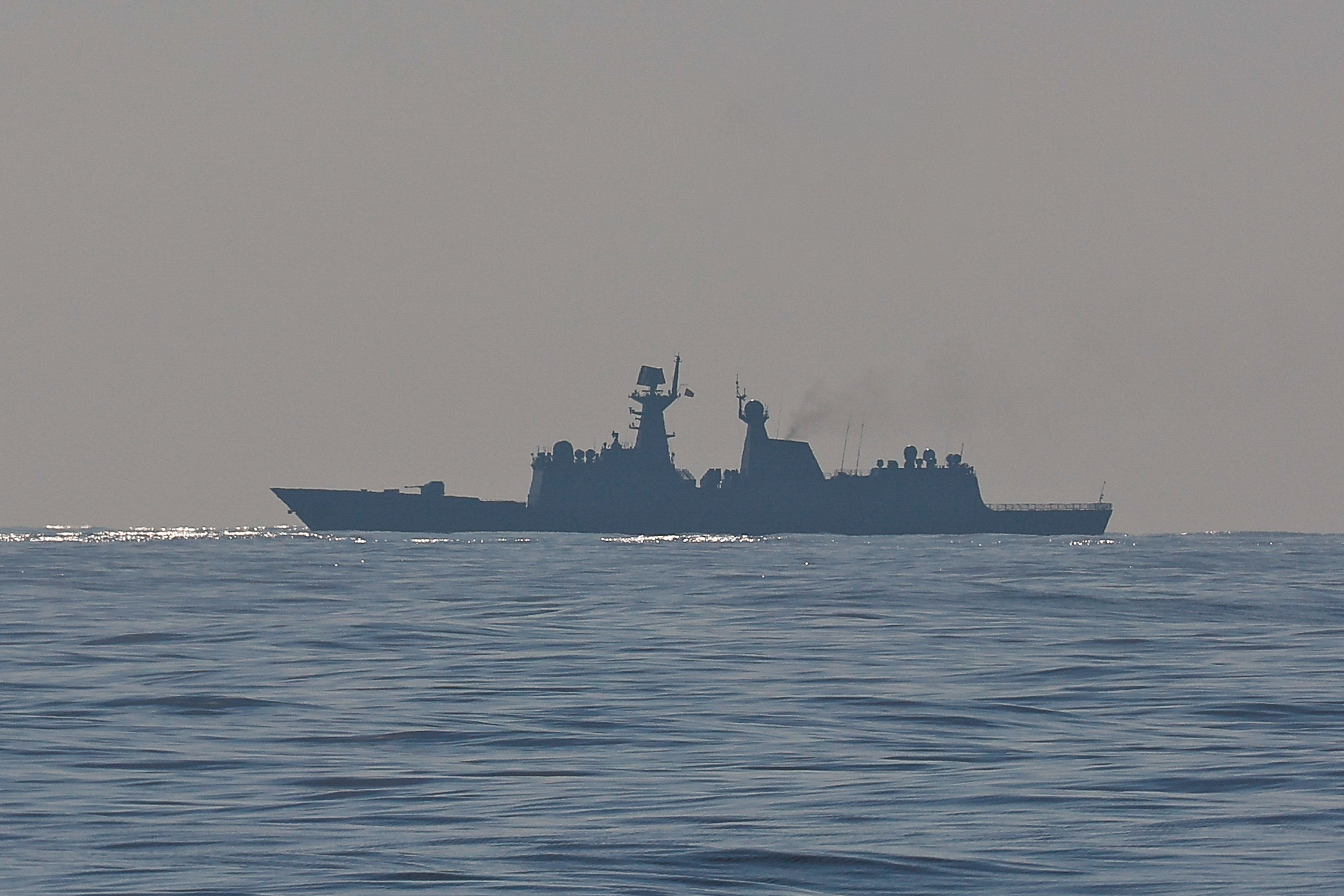 A Chinese warship is seen sailing near several Philippine and United States Navy vessels partaking in a multilateral maritime exercise as part of the Balikatan drills, after Washington deployed advanced missile systems to the Philippines on April 27, 2025. Photo: Getty Images