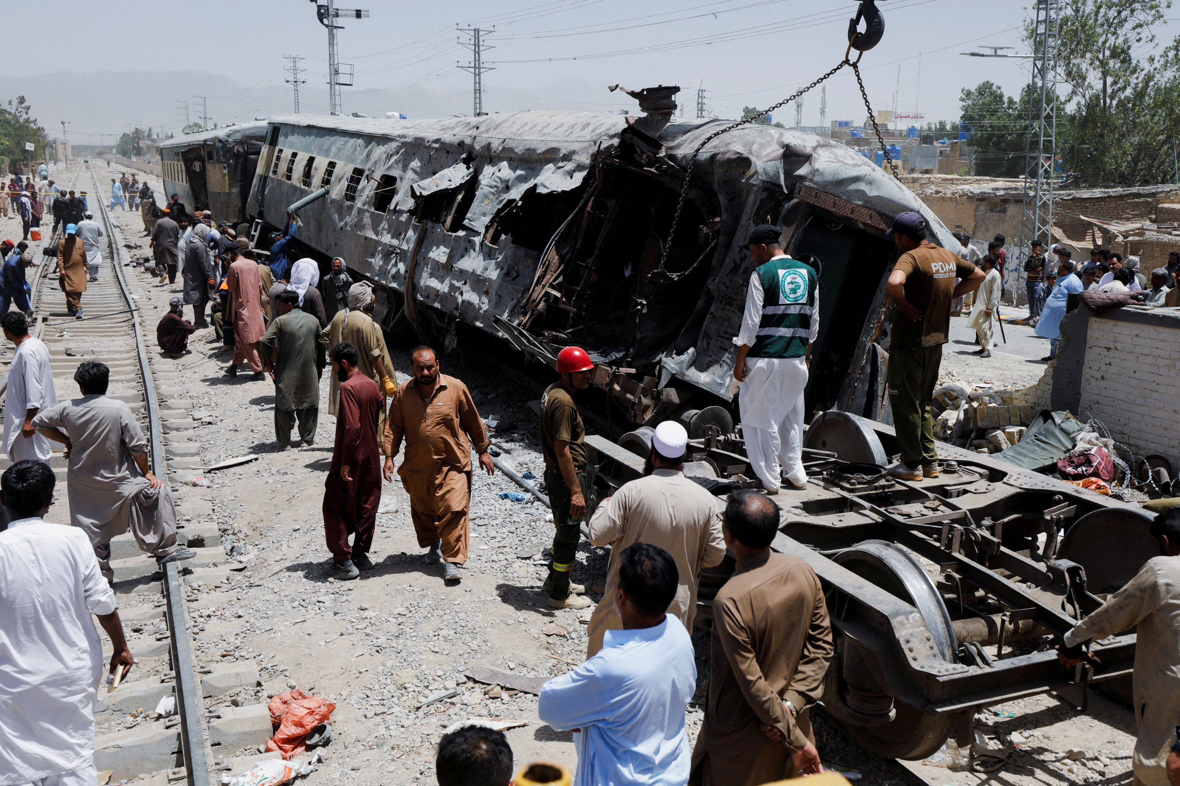 Railway staff work at the site, after a blast near a railway track in Quetta, Pakistan May 24, 2026. REUTERS/Naseer Ahmed     TPX IMAGES OF THE DAY