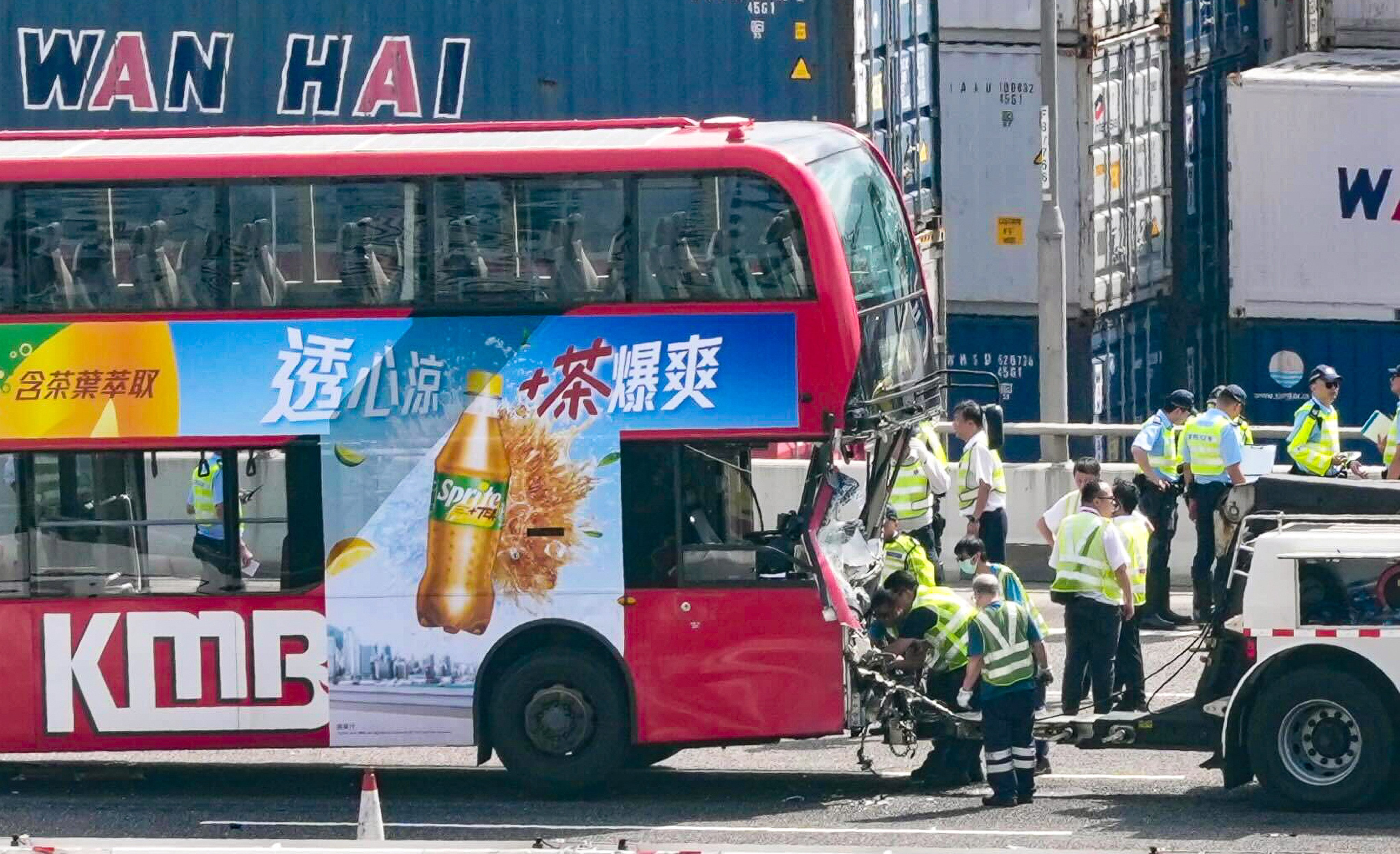 Police and rescue personnel at the scene of the accident. Photo: Karma Lo
