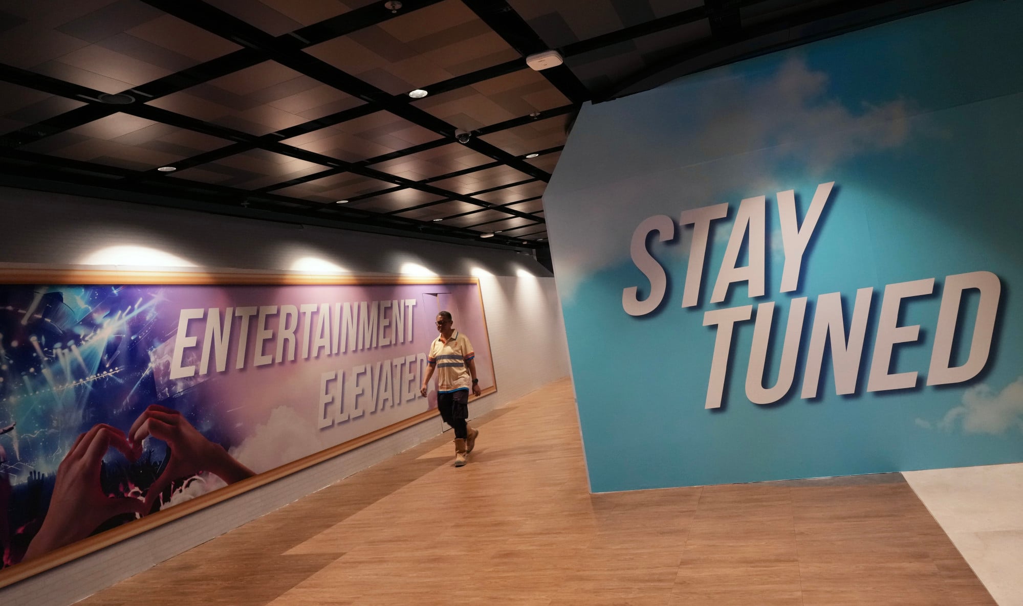 The SCMP recently visited the 11 Skies complex and found it largely empty, with areas cordoned off and store spaces boarded up with hoardings. Photo: Karma Lo The SCMP recently visited the 11 Skies complex and found it largely empty, with areas cordoned off and store spaces boarded up with hoardings. Photo: Karma Lo
