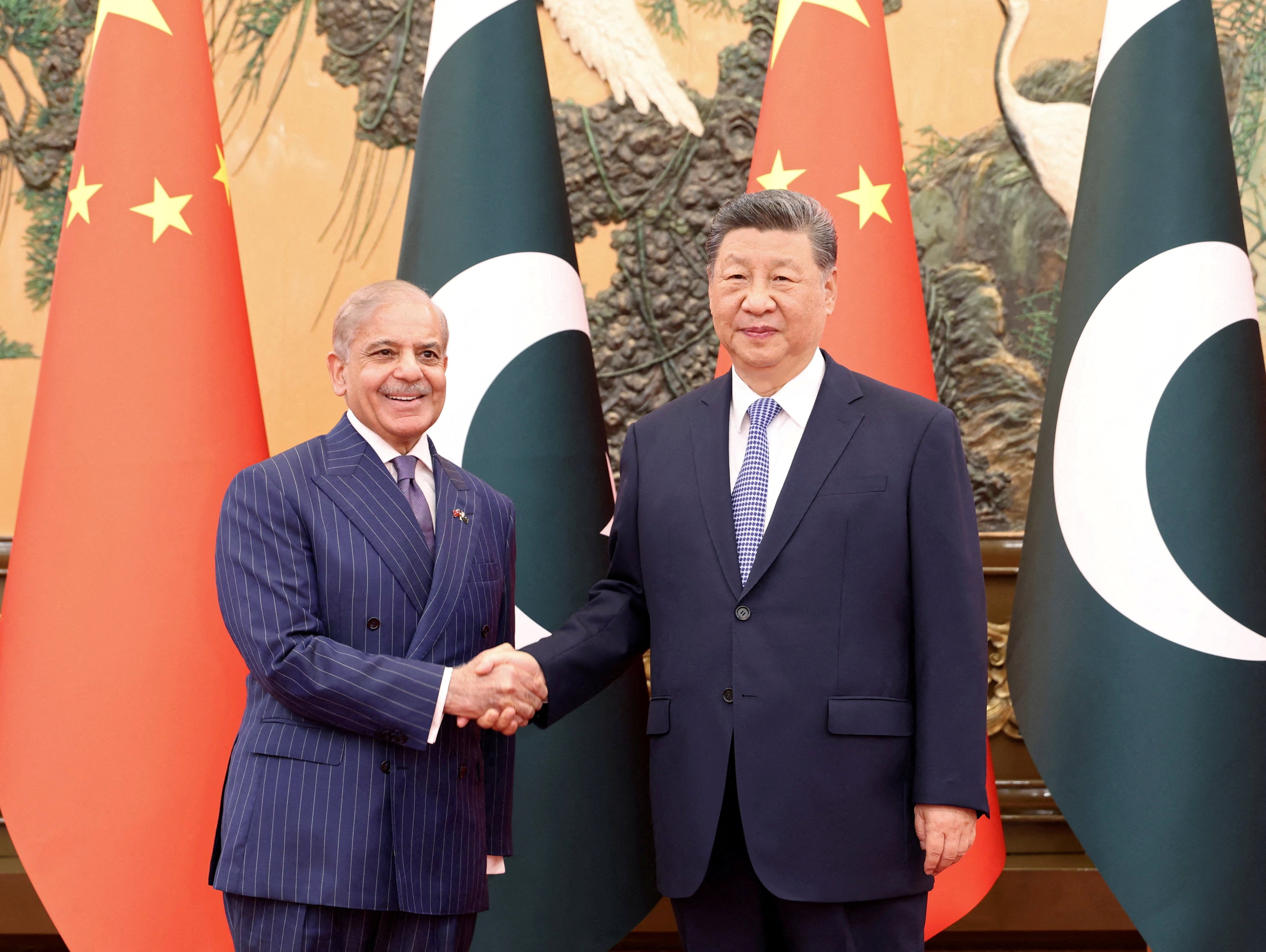 Chinese President Xi Jinping and Pakistani Prime Minister Shehbaz Sharif at the Great Hall of the People, in Beijing on May 25. Photo: via Reuters
