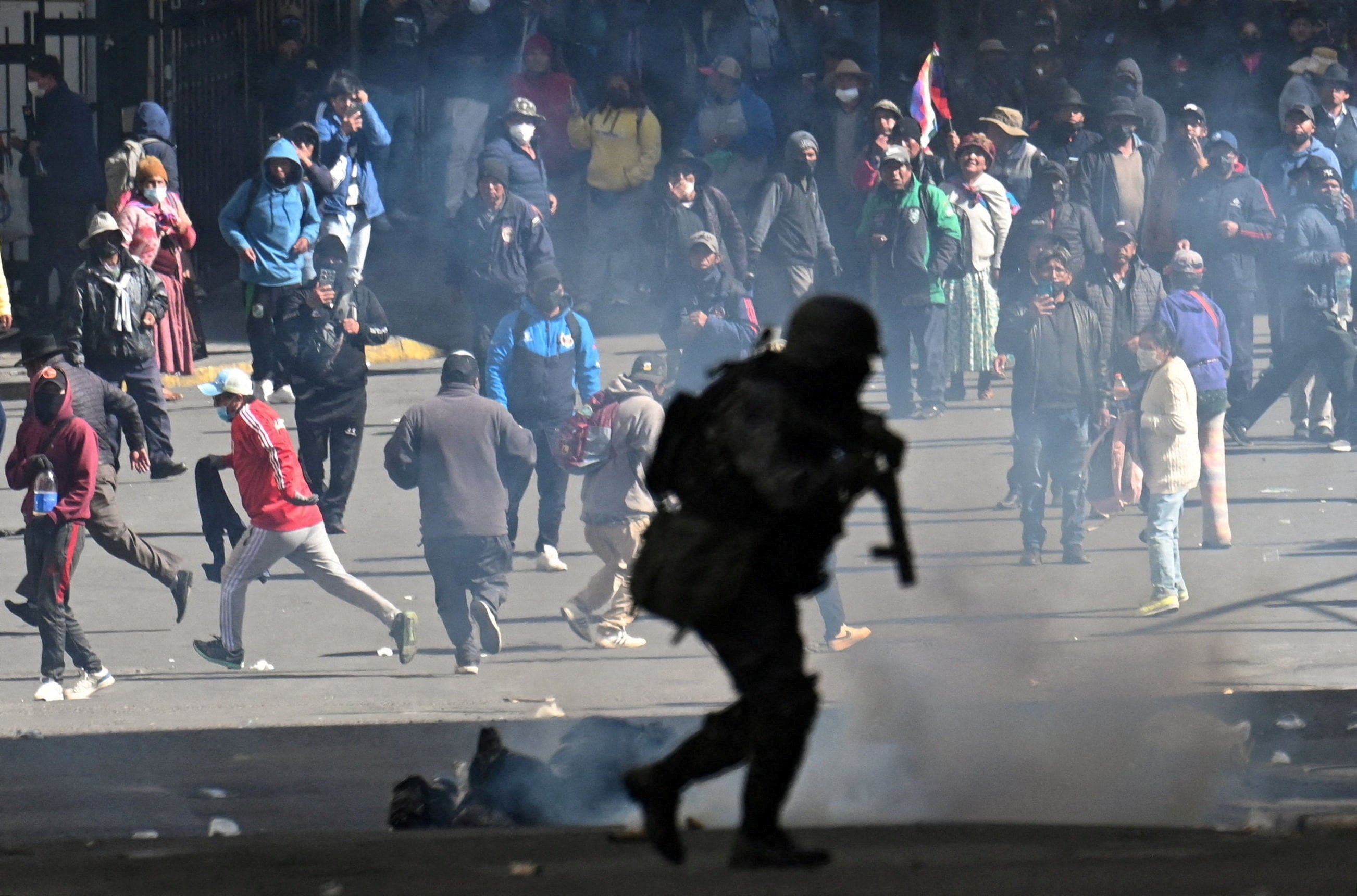 Scenes on Monday in La Paz, where protesters have blocked roads for nearly a month. Photo: Reuters