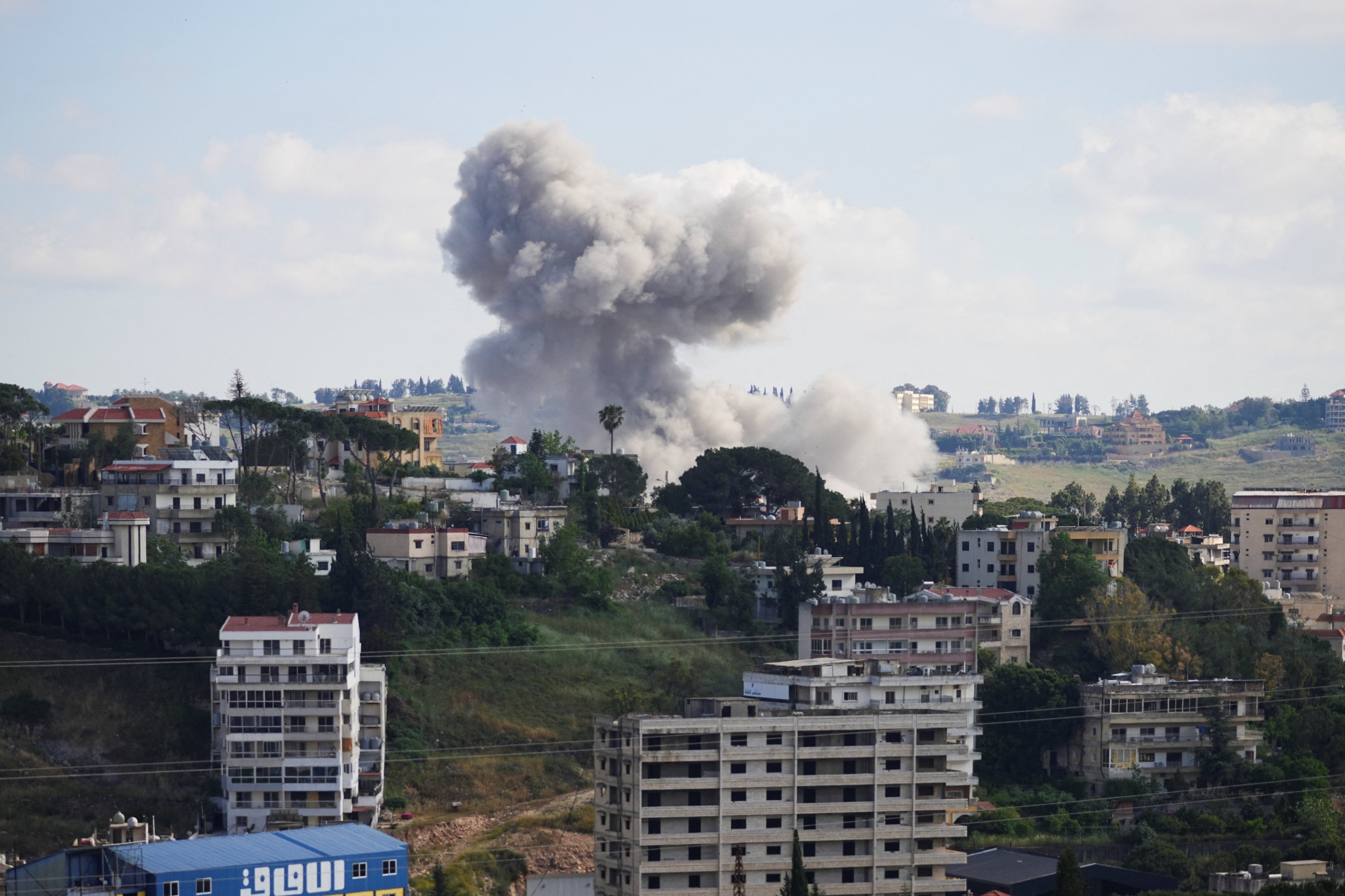 Plumes of smoke billow from southern Lebanon following Israeli strikes, as seen from Nabatieh, Lebanon on Monday. Photo: Reuters