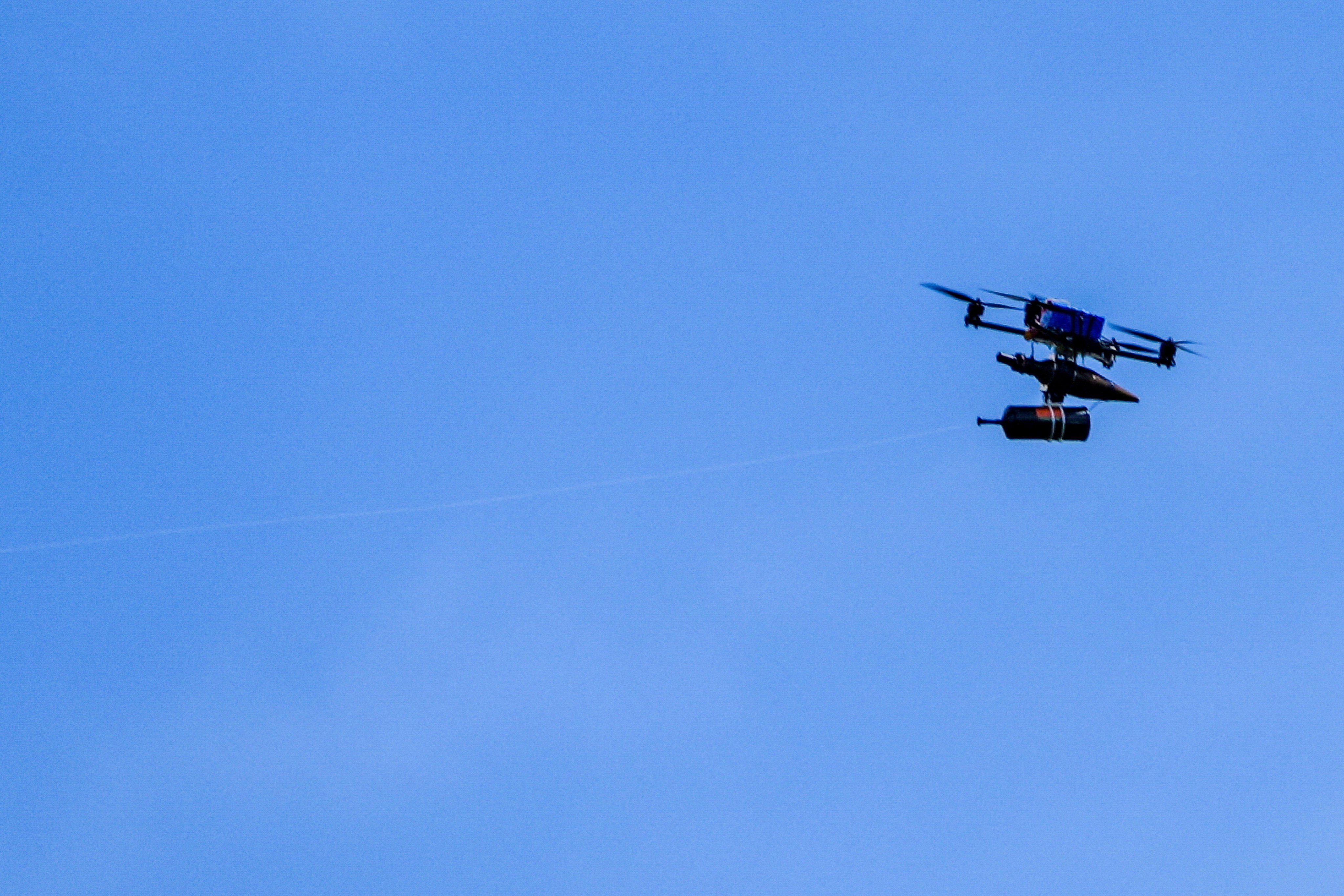 A drone with fiber-optic cable attached flies over the border from Lebanon to Israel. Photo: Reuters