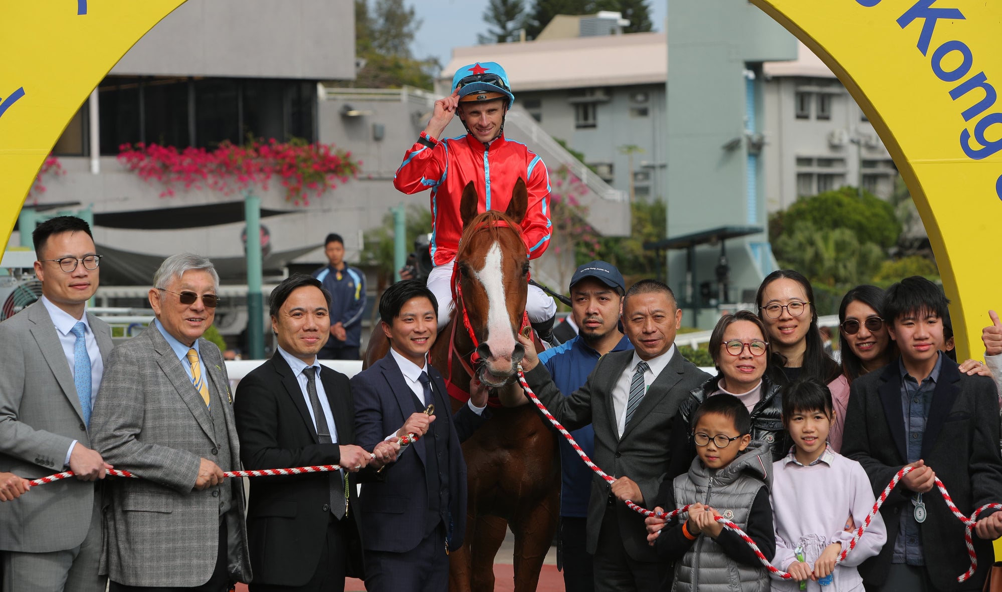 Connections celebrate the win of Happy Shooter at Sha Tin. Connections celebrate the win of Happy Shooter at Sha Tin.