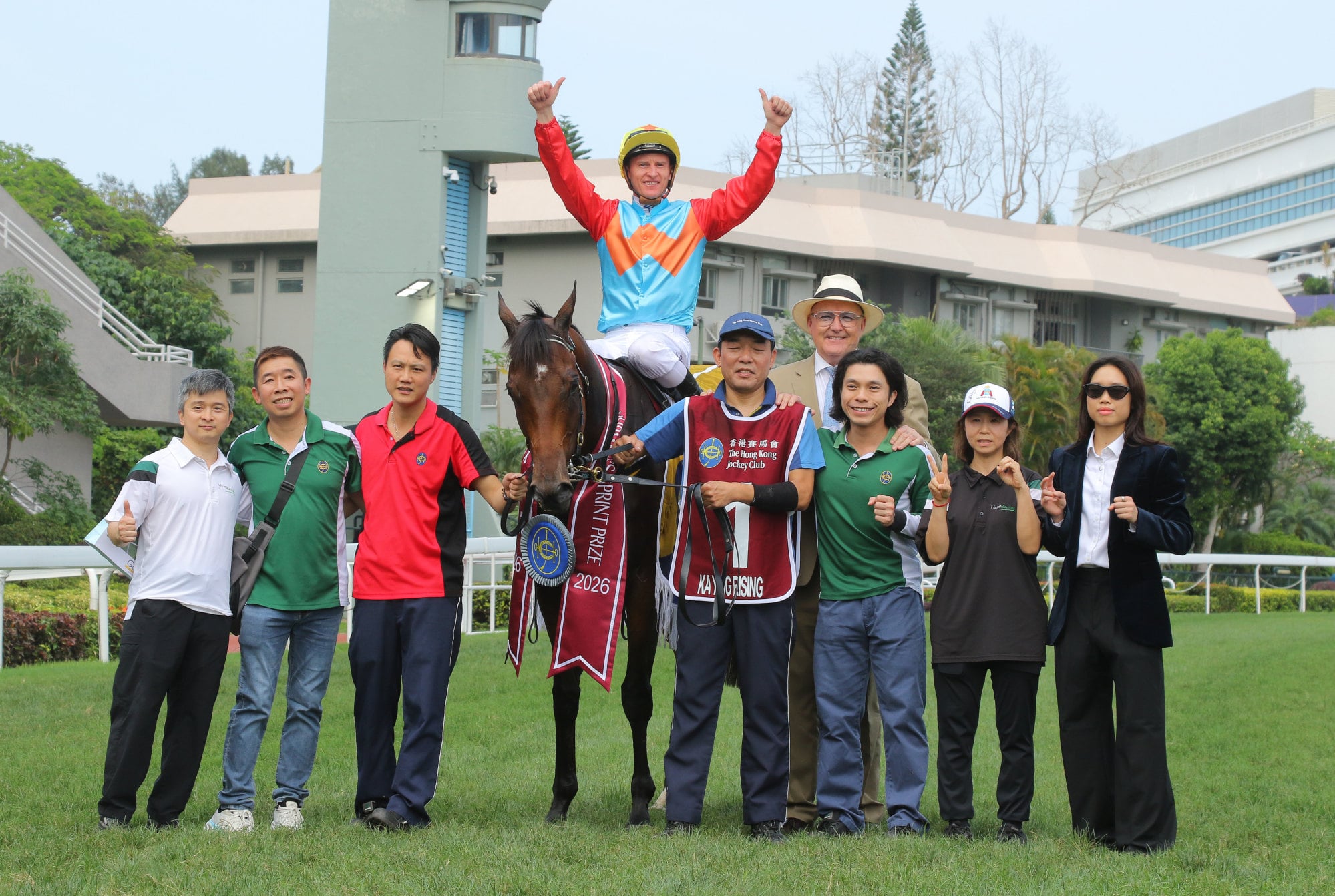 Zac Purton and connections celebrate the win of Ka Ying Rising in the Chairman’s Sprint Prize at Sha Tin. Zac Purton and connections celebrate the win of Ka Ying Rising in the Chairman’s Sprint Prize at Sha Tin.