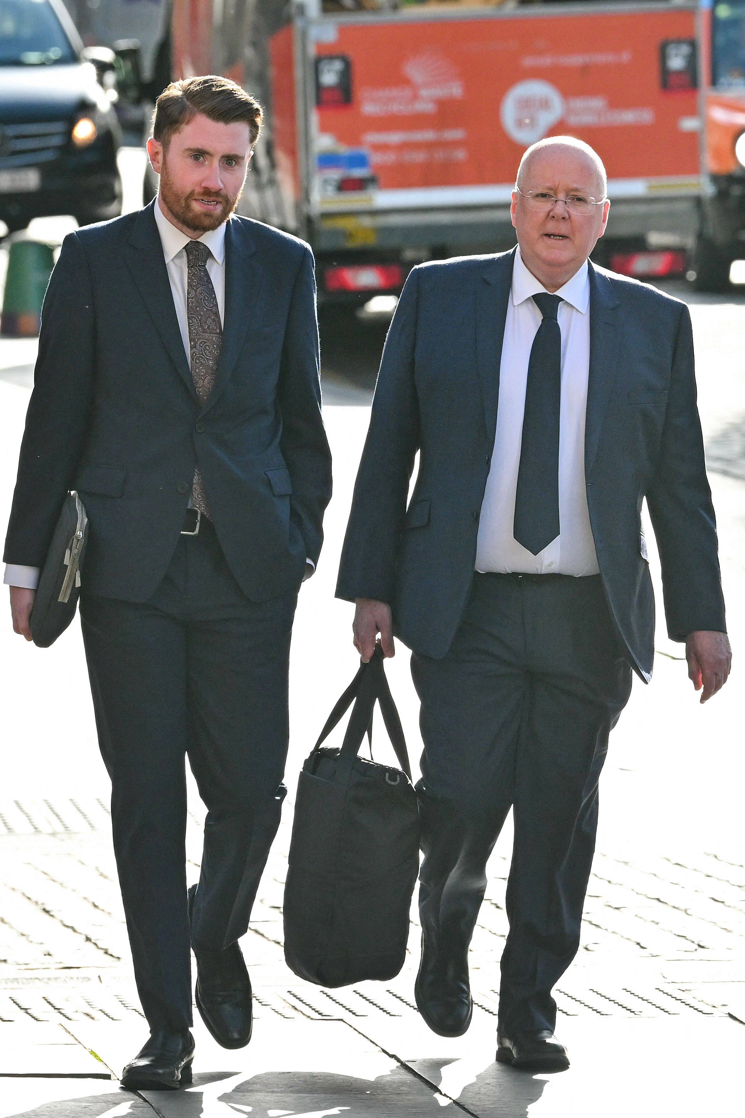 Peter Murrell, right, former CEO for the Scottish National Party (SNP), arrives at the High Court in Edinburgh, Scotland, UK on Monday. Photo: AFP